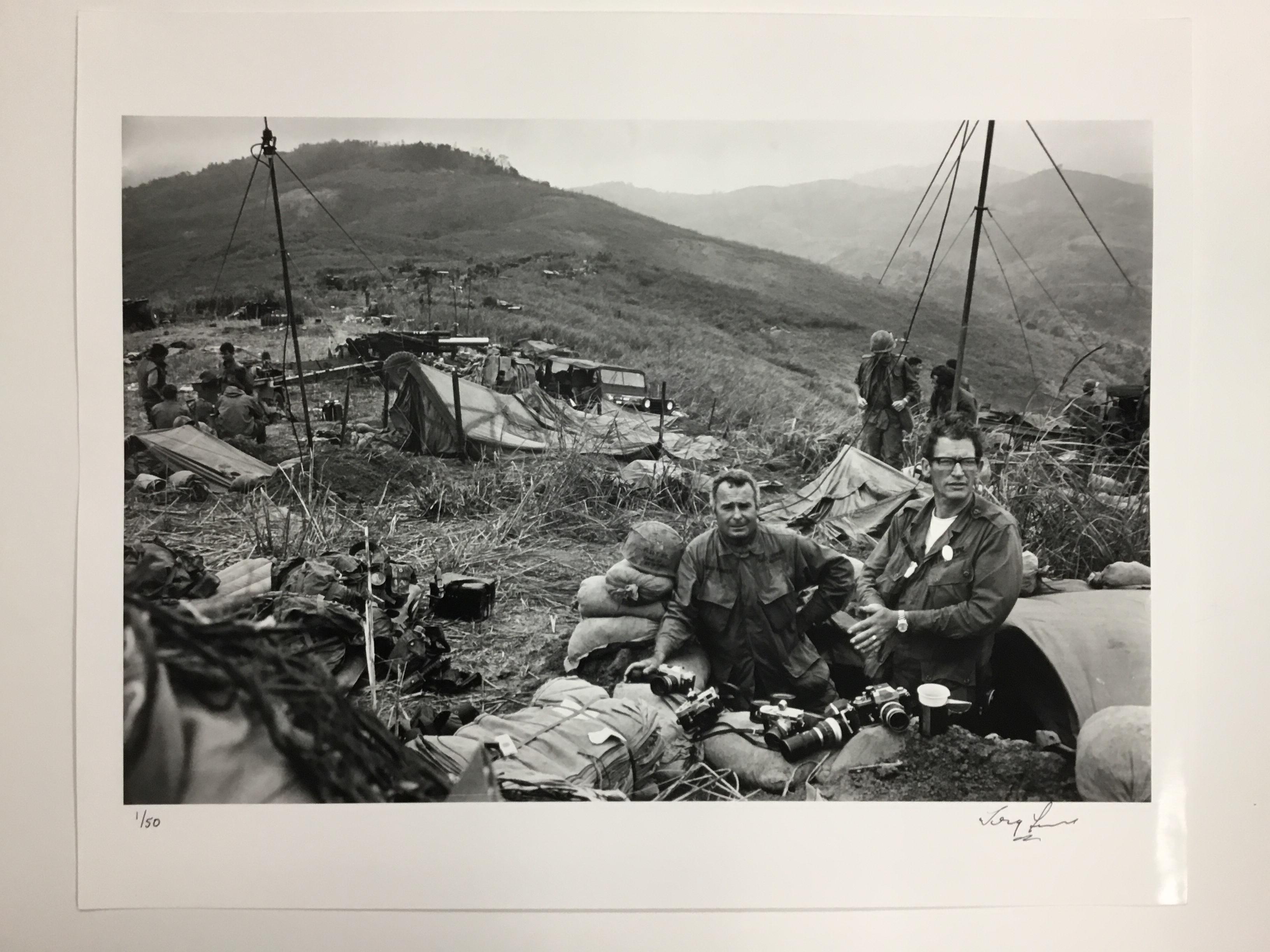 War photographers Terry Fincher of the Daily Express, left, and Larry Burrows from Life Magazine, right, on Hill Timothy, Vietnam. (Photo by Express Newspapers/Getty Images)

DETAILS
- Rare signed print, signature on front.
- Hand printed silver