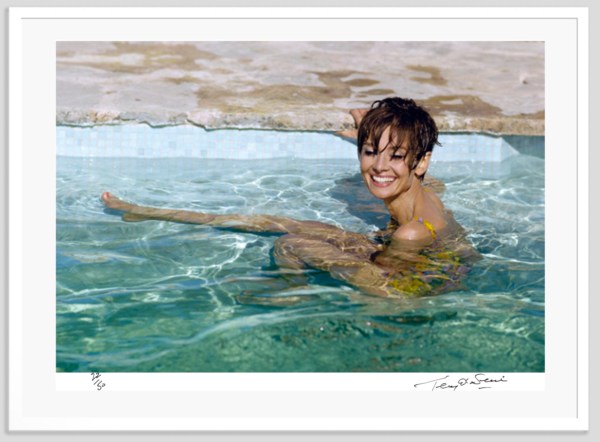 Audrey Hepburn in Pool 1966 (Framed) - Photograph by Terry O'Neill