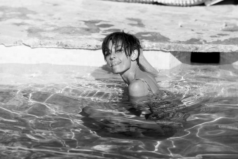 Terry O'Neill Black and White Photograph - Audrey Hepburn in Pool