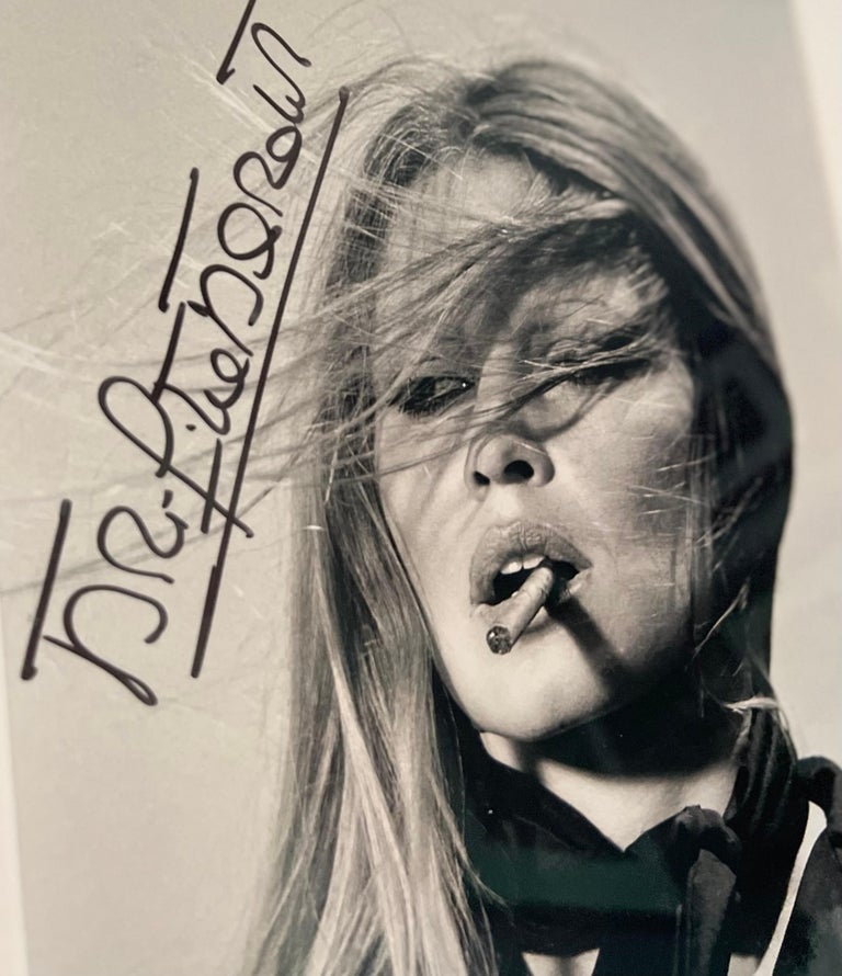 Brigitte Bardot With Cigar In Mexico - hand signed by Brigitte Bardot framed  - Modern Photograph by Terry O'Neill