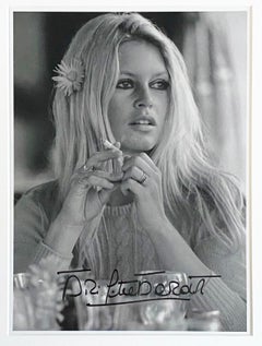 Brigitte Bardot With Flower - hand signed by Brigitte Bardot framed