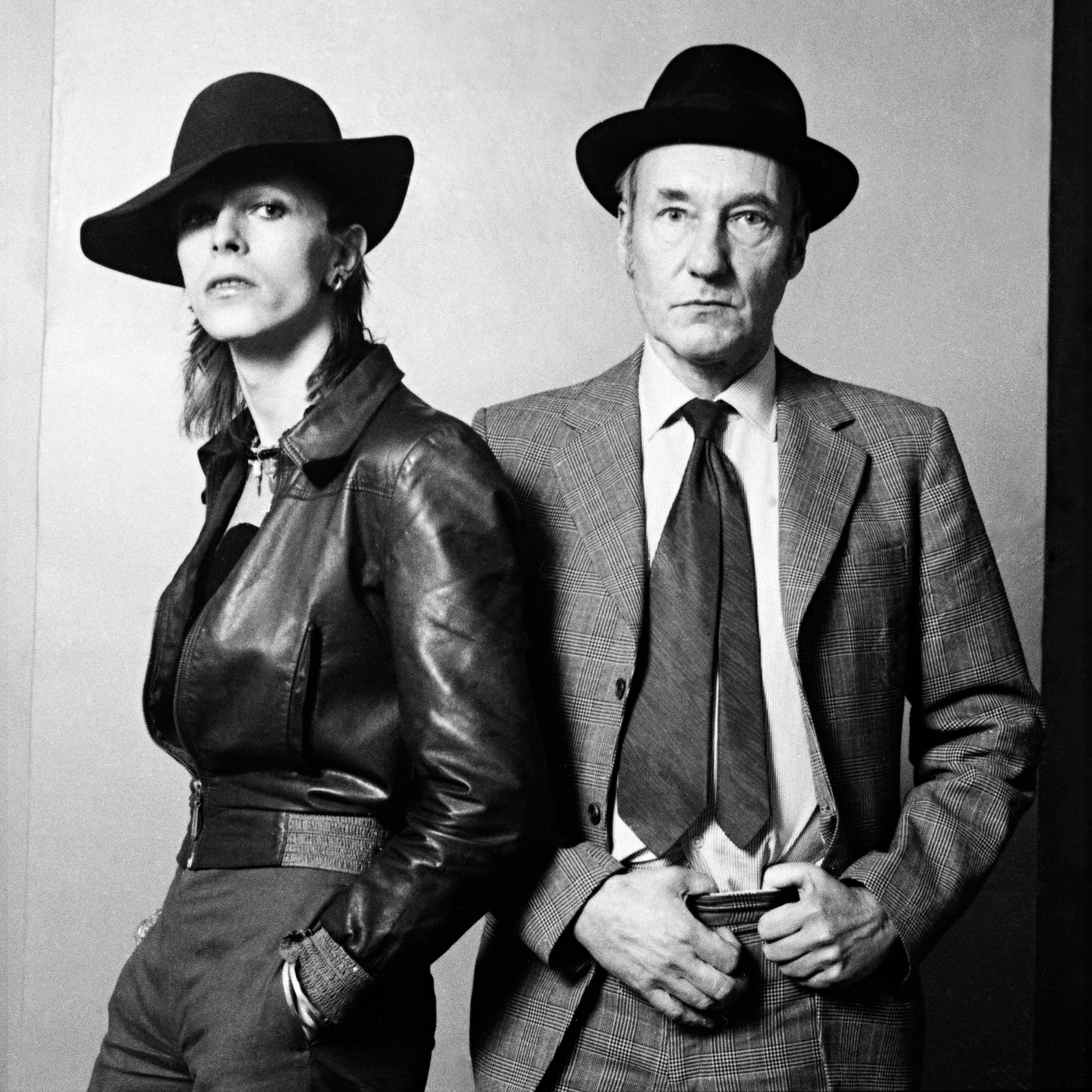 Framed, 20x24" signed lifetime edition print by Terry O'Neill of David Bowie with William Burroughs, taken for an interview published at Rolling Stone magazine in February 28, 1974.

Signed limited edition number 2/50

This 20x24" silver gelatin