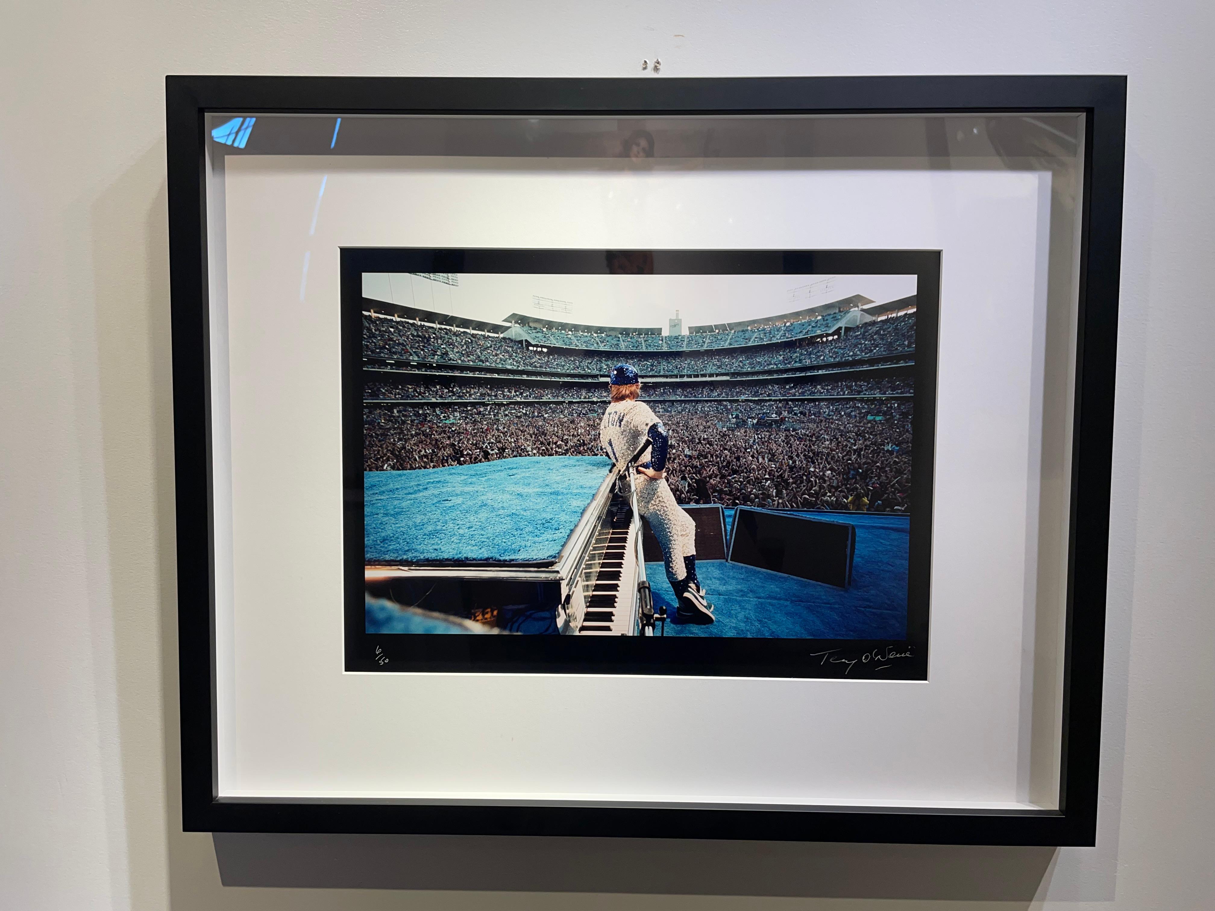Elton John At Dodger Stadium, Back View, Custom Framed  - Photograph by Terry O'Neill