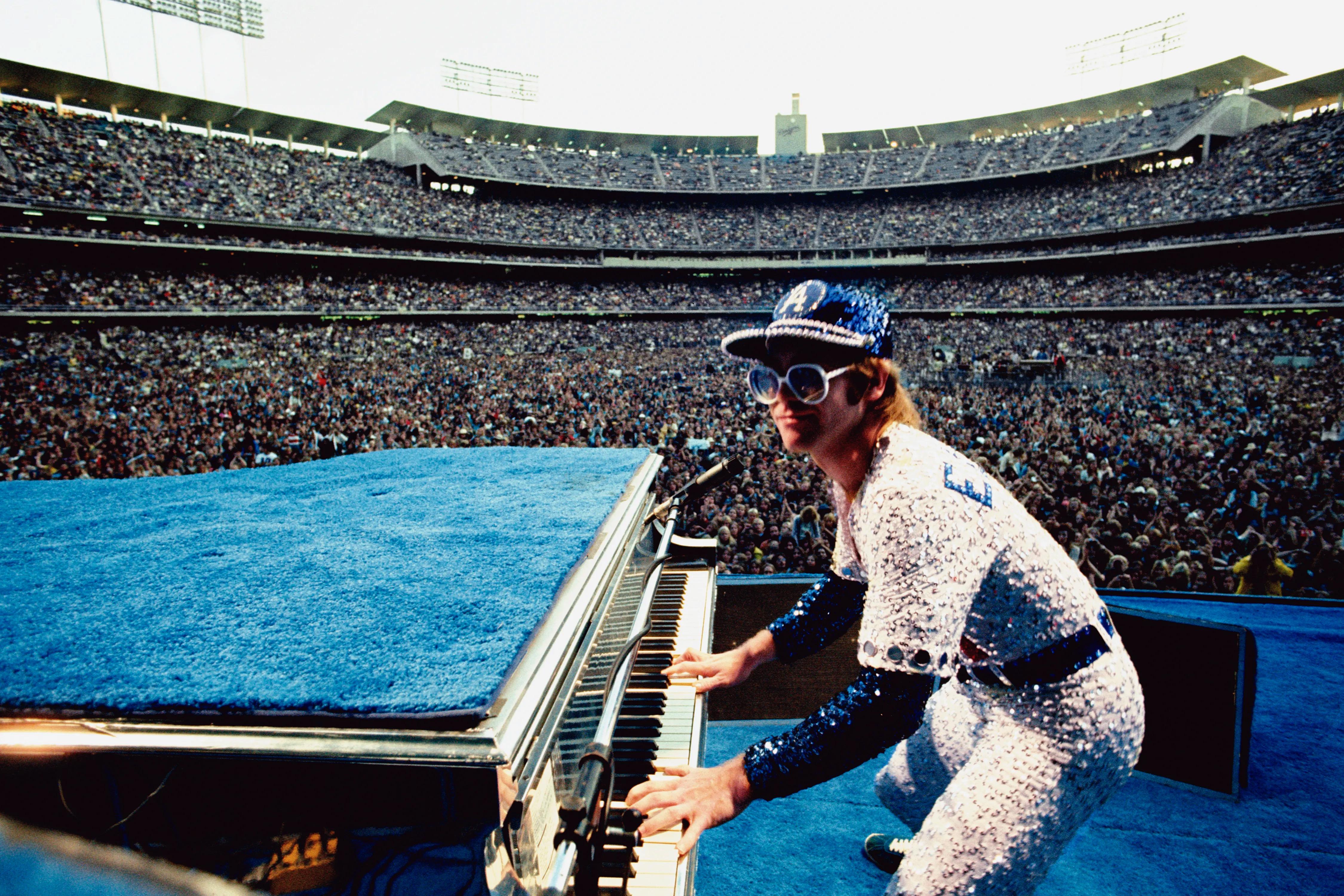 Elton John, Dodger Stadium, 1975 - Photograph by Terry O'Neill