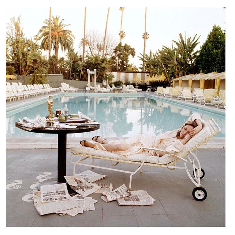 Terry O'Neill Color Photograph - Faye Dunaway at the Pool, Lying Down, Posthumous (30" x 30")