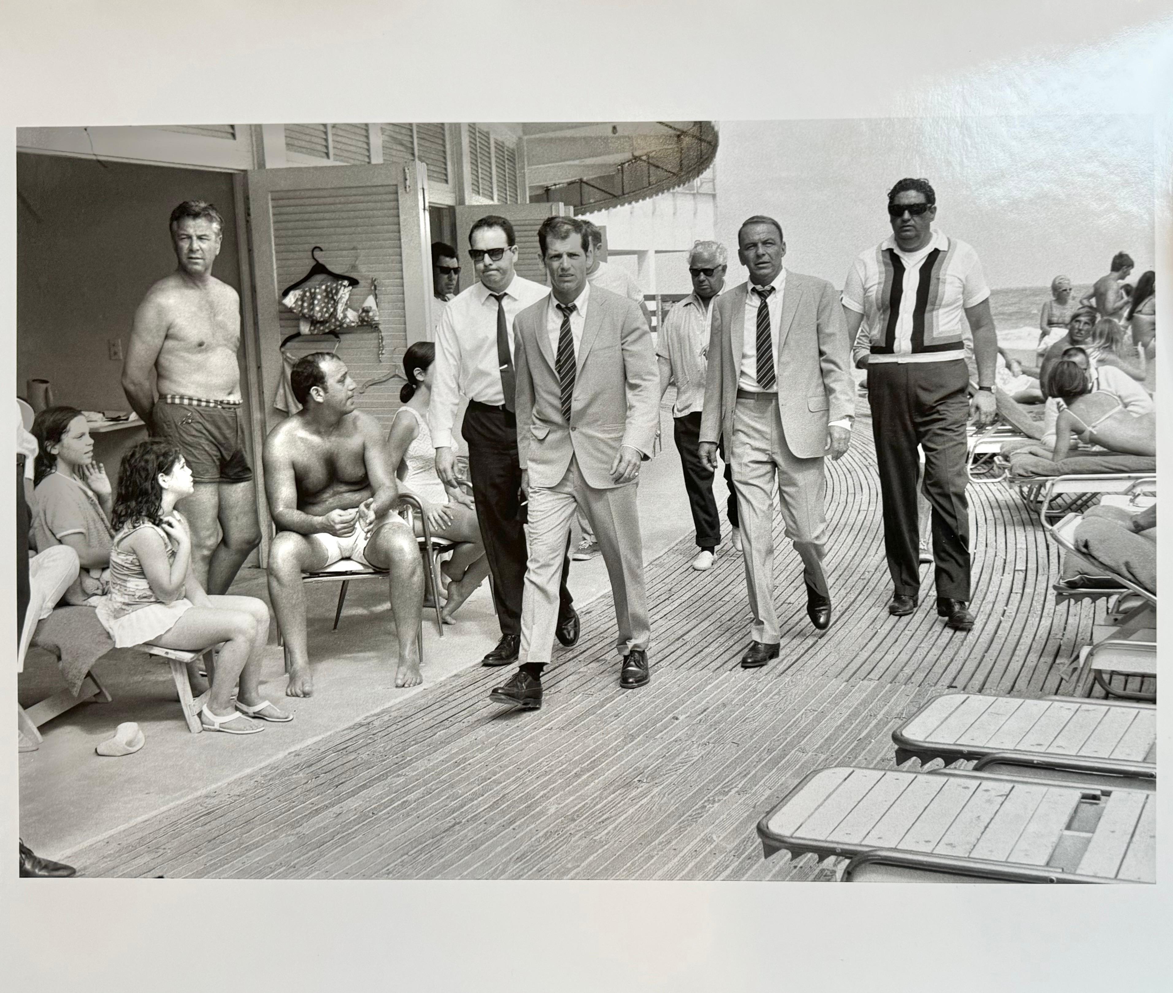 One of Terry O’Neill’s best known images Singer and actor Frank Sinatra, with his minders and his stand in (who is wearing an identical outfit to him) arriving at Miami beach while filming, ‘The Lady in Cement’ 1968.

(photo by Terry O’Neill )

A