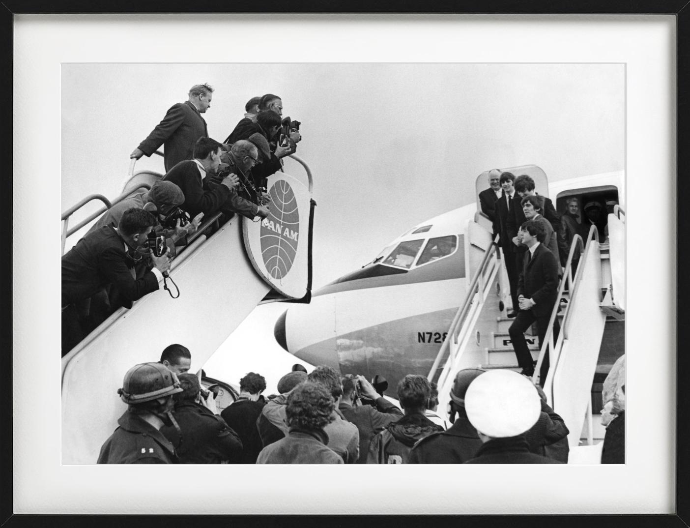 Heathrow Airport, the Beatles returning to the UK, black and white photography, by Terry O'Neill in 1964.

All prints are limited edition. Available in multiple sizes. High-end framing on request.

All prints are done and signed by the artist. The