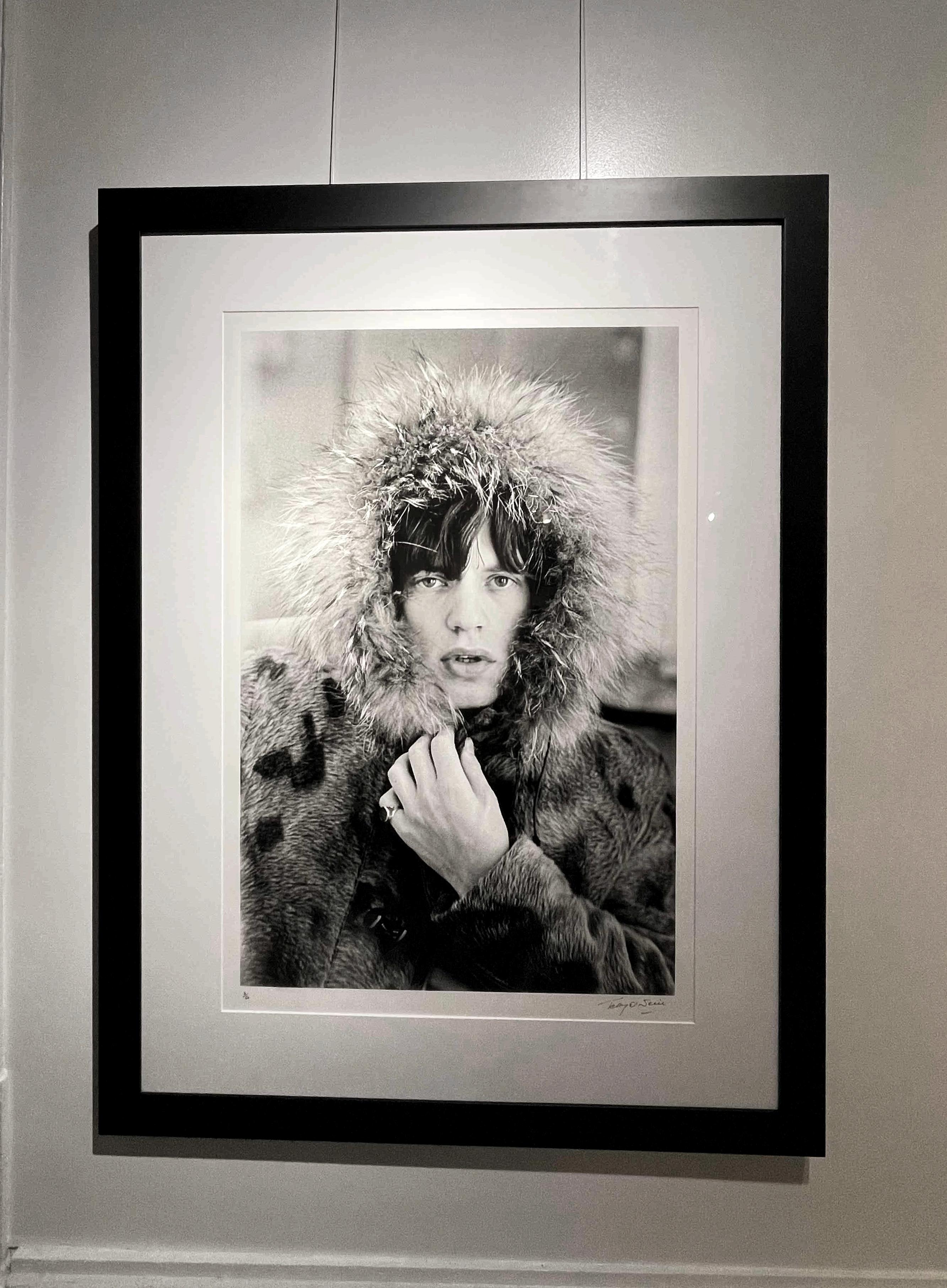 Mick Jagger Parka, 1964 Signed Limited Edition, Framed - Photograph by Terry O'Neill