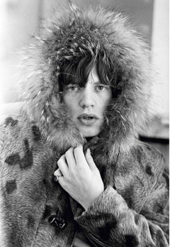Mick Jagger - the rockstar in the snow in a fur coat