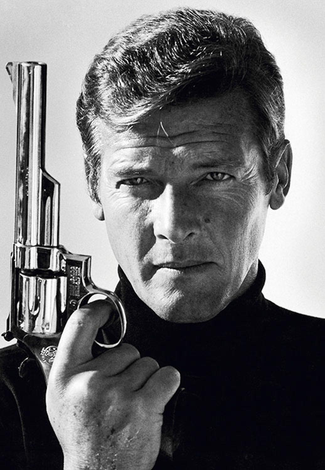 Terry O'Neill Black and White Photograph - Roger Moore as James Bond