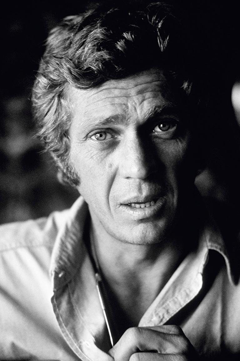 American actor Steve McQueen sitting on his desk in his Hollywood office, 1969.

Signed and Numbered Lifetime Edition Gelatin Silver Print from the Terry O’Neill Estate:

20" x 16" - Edition of 50 + 10 AP

Numbered Posthumous Edition Silver Gelatin