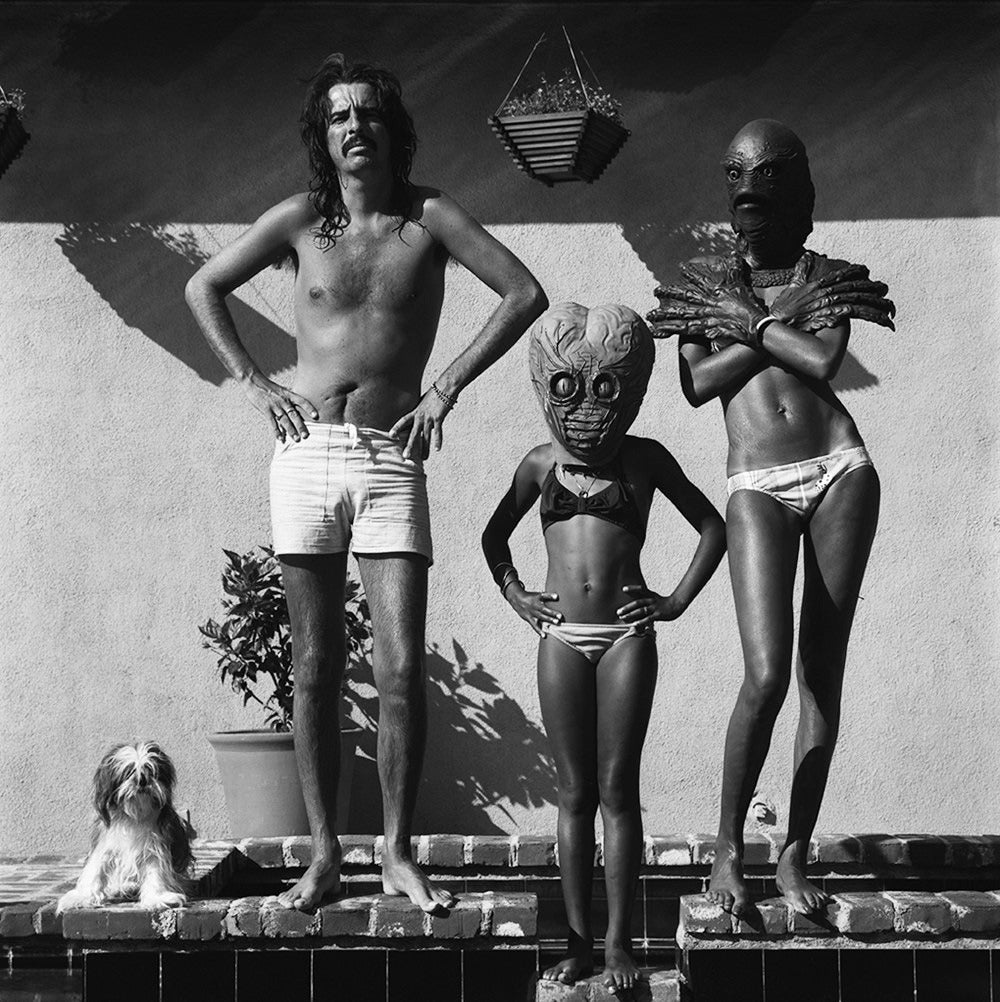 Alice Cooper, Los Angeles, 1974, Printed Later
Silver gelatin print
40 x 40 inches
estate stamped and numbered edition of 50 
with certificate of authenticity 

Terry O'Neill, Alice Cooper with his wife and daughter at home, Los Angeles,