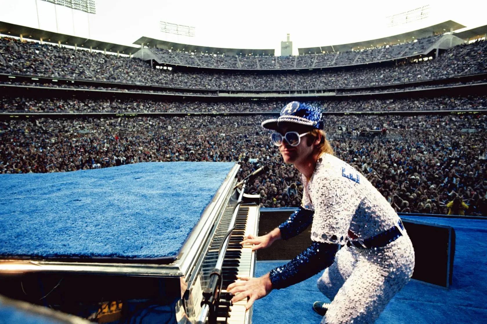 Elton John and his Airplane, Los Angeles, CA
1975 (printed latter)
Lifetime Edition C-print
Edition of 50/50 
Signed, numbered and dated with certificate of authenticity 

Wearing a custom LA Dodgers sequined uniform by Bob Mackie, Elton performs at