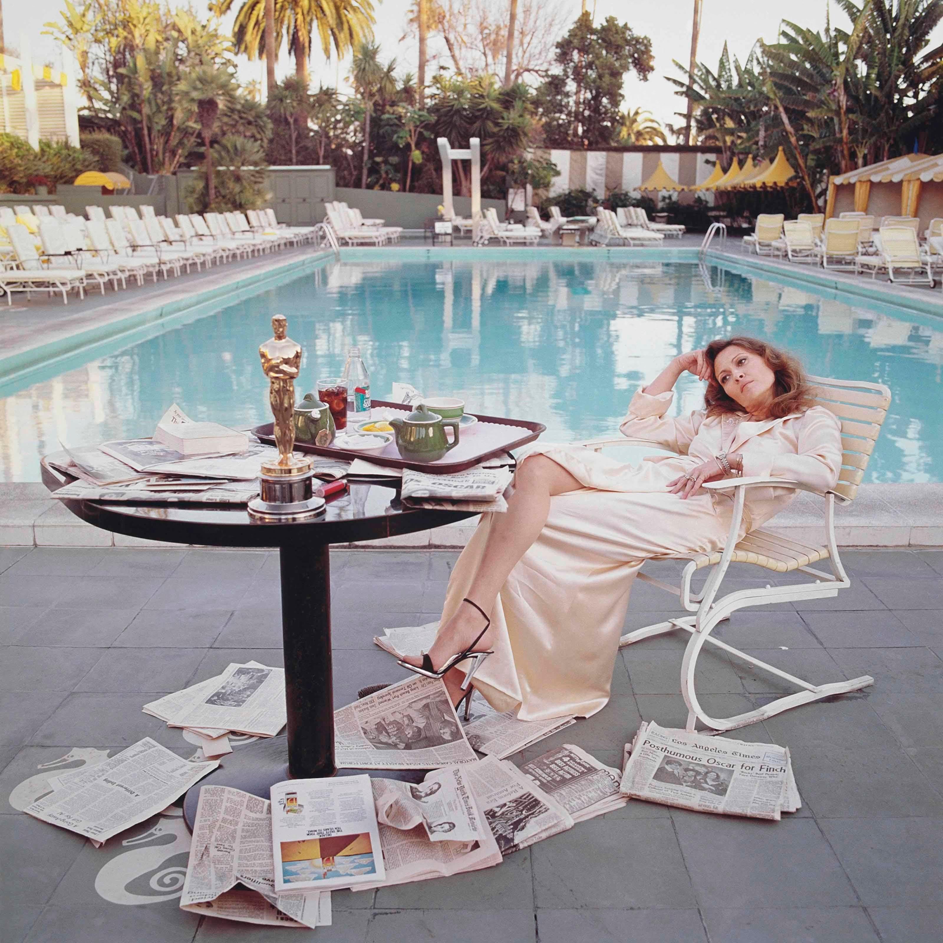 Faye Dunaway at the Beverly Hills Hotel, the morning after the Oscars, photographed by Terry O’Neill, 1977.

Terry O'Neill
1938 - 2019
'Faye Dunaway', 1977
Chromogenic print, printed later. Signed by Terry O'Neill and numbered 9/50 in ink in the