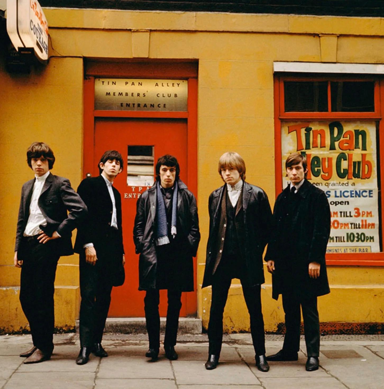 The Rolling Stones are photographed outside the Tin Pan Alley Club in London in 1963. From left to right, Mick Jagger, Keith Richards, Bill Wyman, Brian Jones (1942 – 1969) and Charlie Watts. Active for six decades, the group pioneered the gritty,