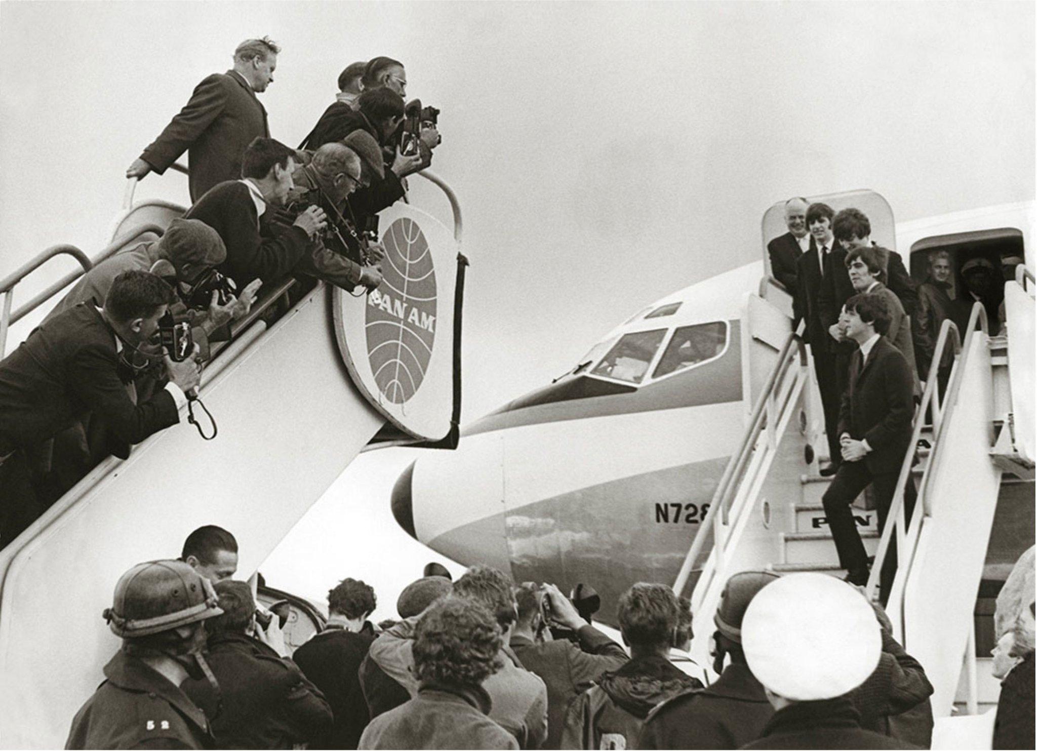 Terry O'Neill Figurative Photograph - The Beatles Heathrow