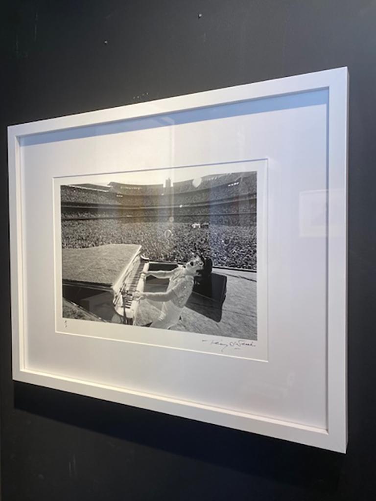 Terry O'Neill Black and White Photograph - Elton John Dodgers Stadium, Howling (1975) Custom Framed White Lacquer