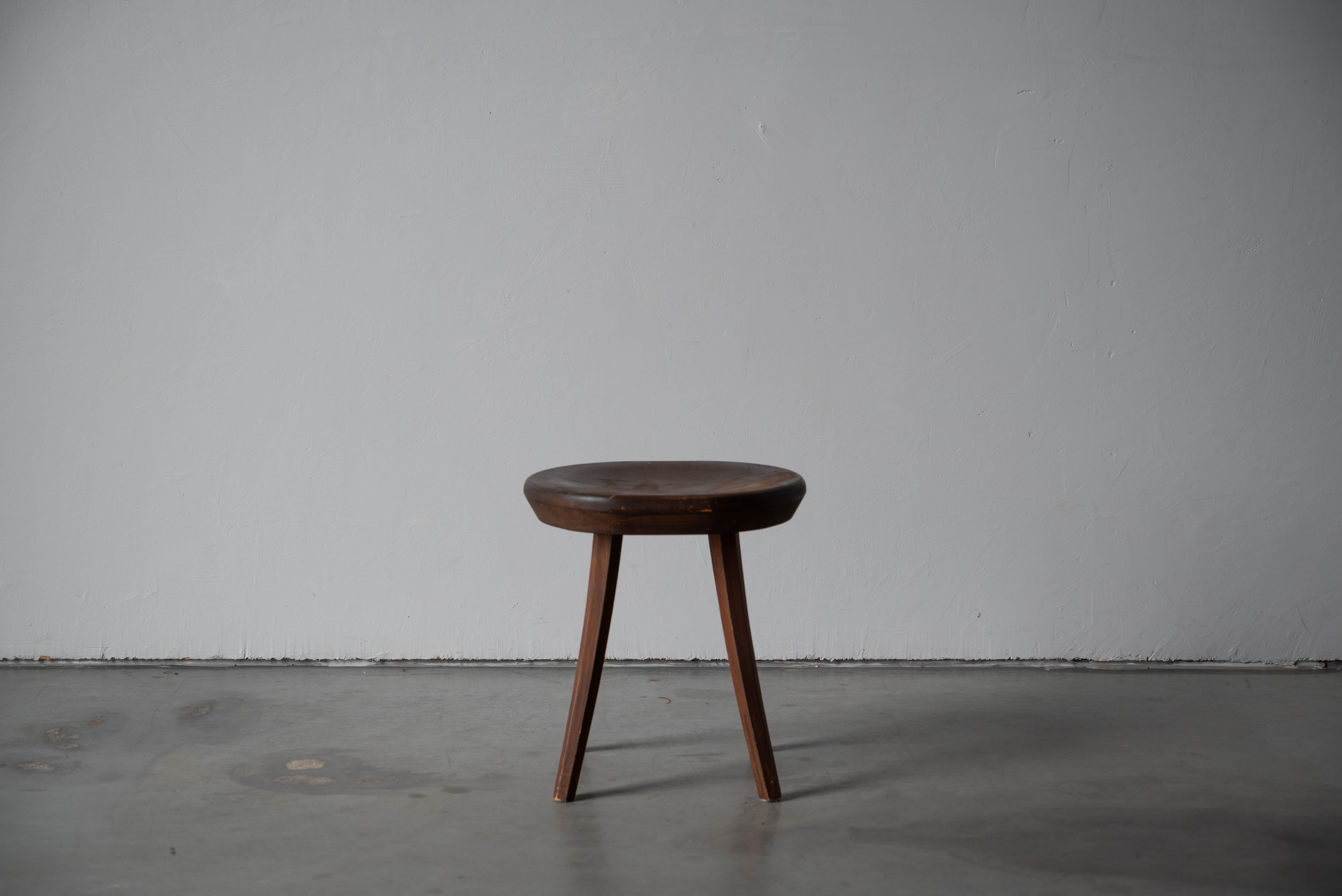 A stained pine stool designed and produced by Tervasaaren Puutyötehdas, Finland, 1960s.