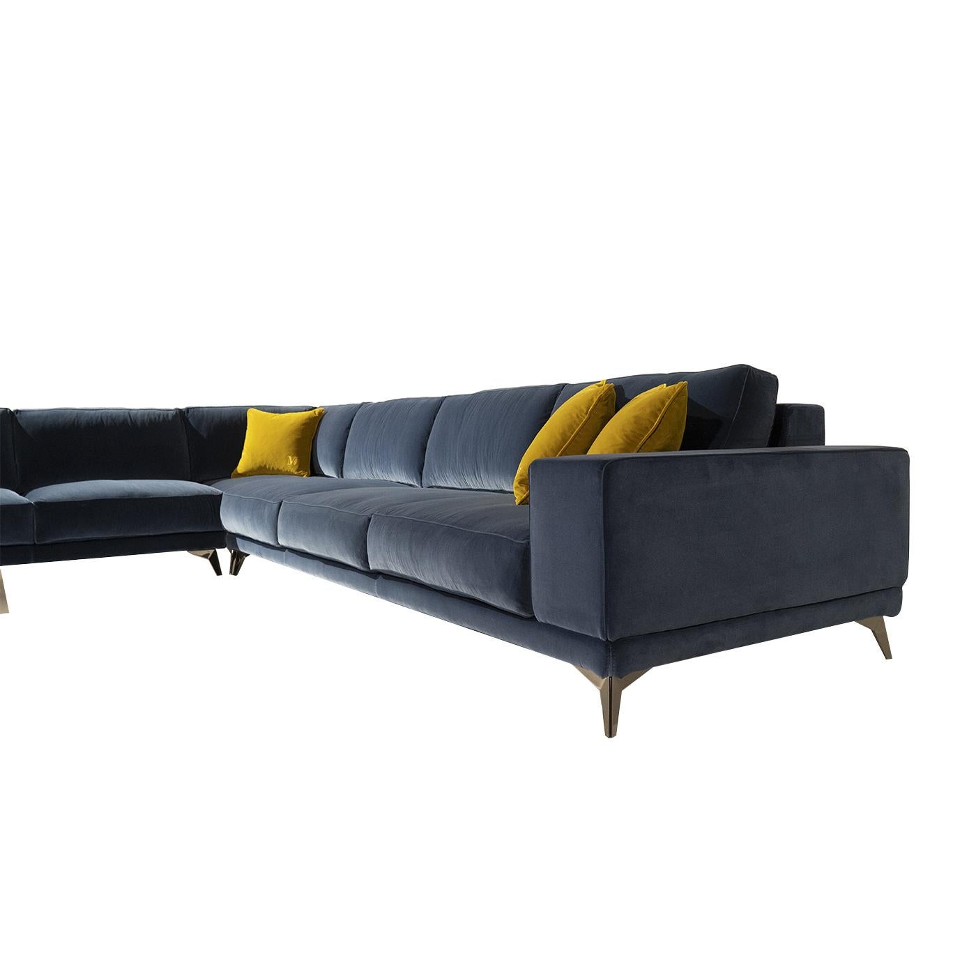 A sofa be a decorative piece as well as useful, as proves this gorgeous contemporary modular sofa from the Cosmopolitan collection, in a dark blue cotton velvet. Timeless class and sophistication characterize this sofa, which has raised
