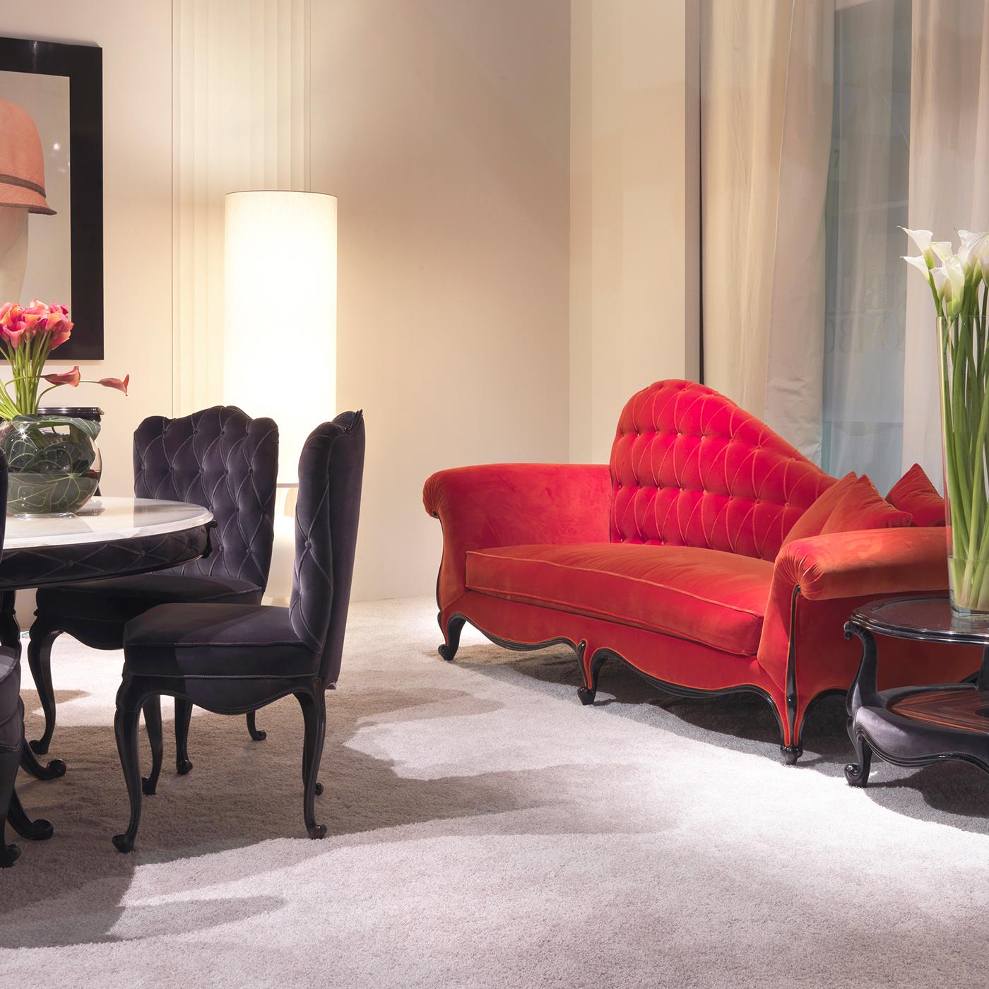 Vintage-inspired with dainty decorative details defines the captivating personality of this stylish dormeuse flaunting a velvet upholstery in flaming red. Its harmonious, romantic profile is the result the generous padding of the cherry wood frame,