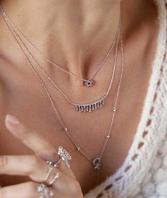 Tess Van Ghert 18K gold and baguette diamond fringe necklace