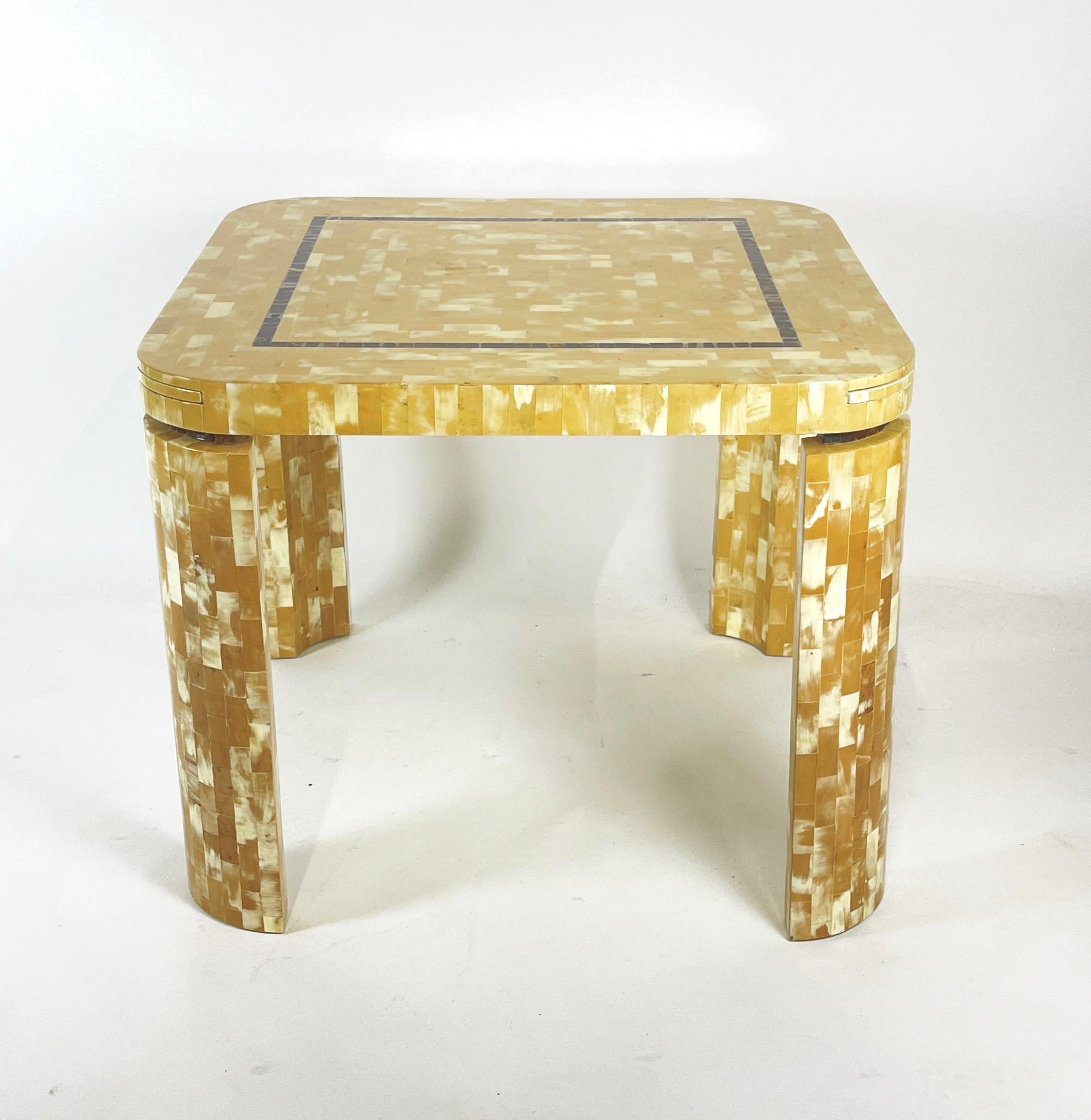 Amazingly decorative and chic game table designed by Enrique Garcel for Jimeco. This table is oddly reminiscent of both the clean sleek lines of Karl Springer while echoing the patchwork design of Paul Evans. This piece retains the original tags