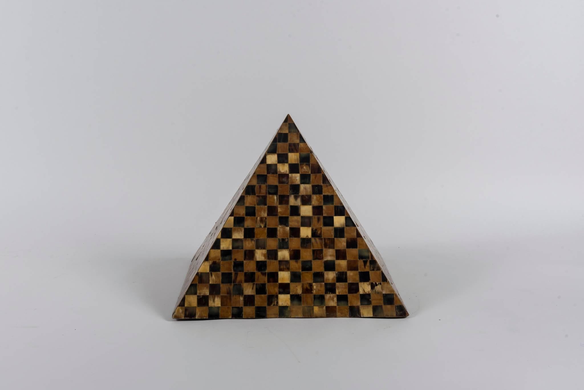 A vintage tessellated tri-tone horn pyramid.