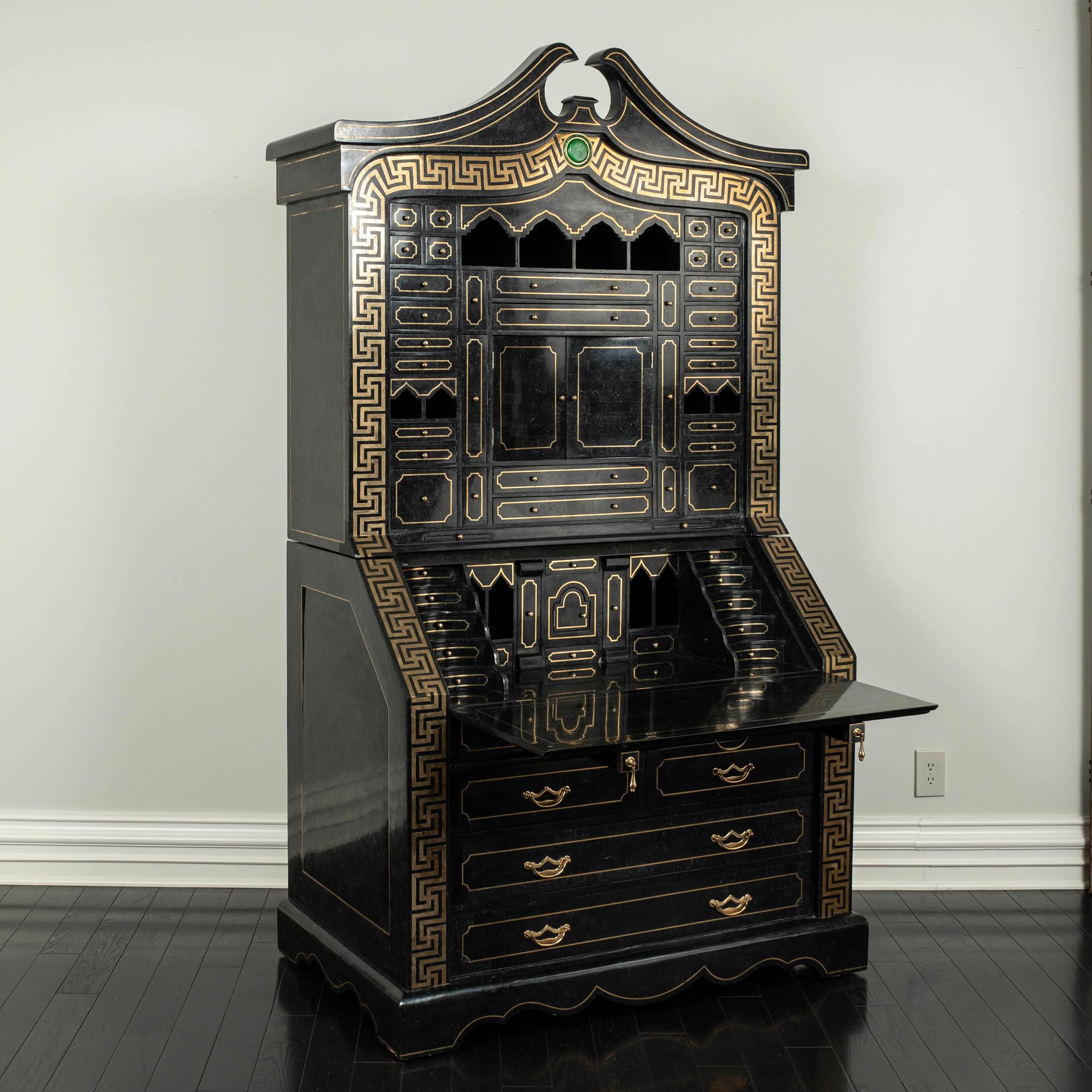 Maitland Smith 20th Century tessellated black marble Secretary. This phenomenal and monumental cabinet is enrobed in polished black marble with solid brass inlaid Greek key detailing. The lower cabinet features four main drawers with two pull out
