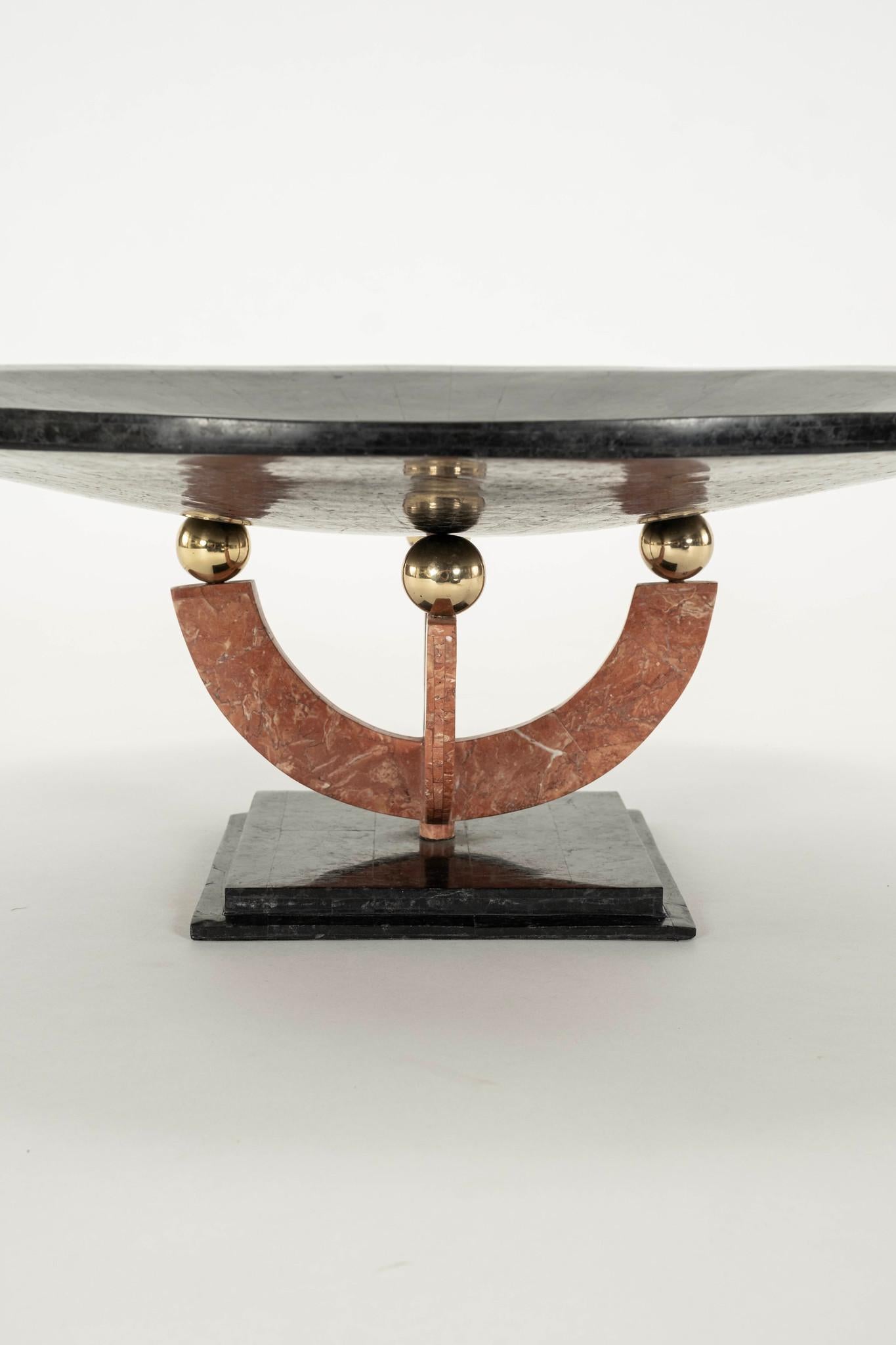 Elevate your dining or living space with this stunning tessellated marble and brass centerpiece, a true statement piece that combines luxurious materials and modern design. This exquisite vintage centerpiece compote features a beautifully crafted