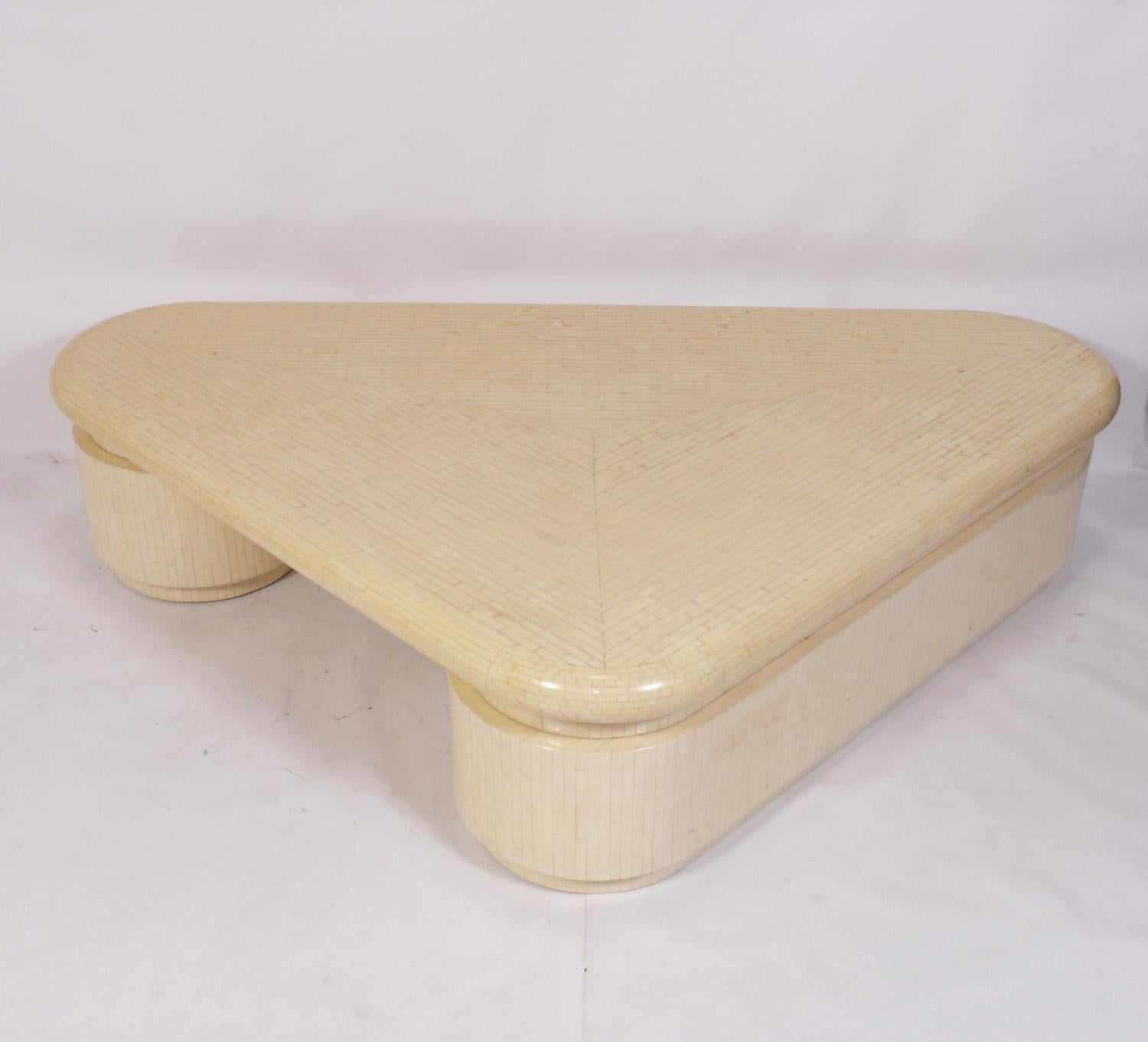 Tessellated Bone coffee table, in the manner of Karl Springer, American, circa 1980s. Large scale sculptural form. Retains warm original patina.