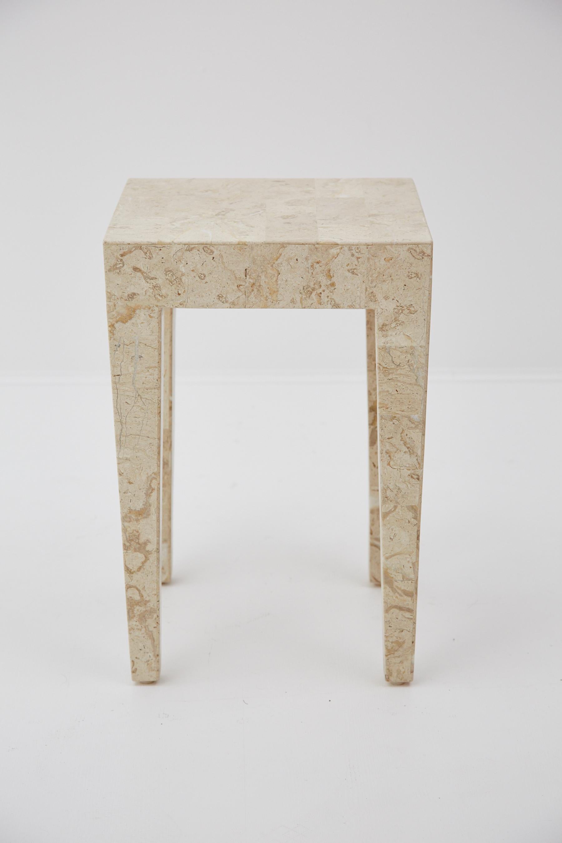 Side table comprised of fiberglass body inlaid with tessellated cantor stone throughout. A simple and modern form to add form and texture to any interior. Measures: 21 in tall.