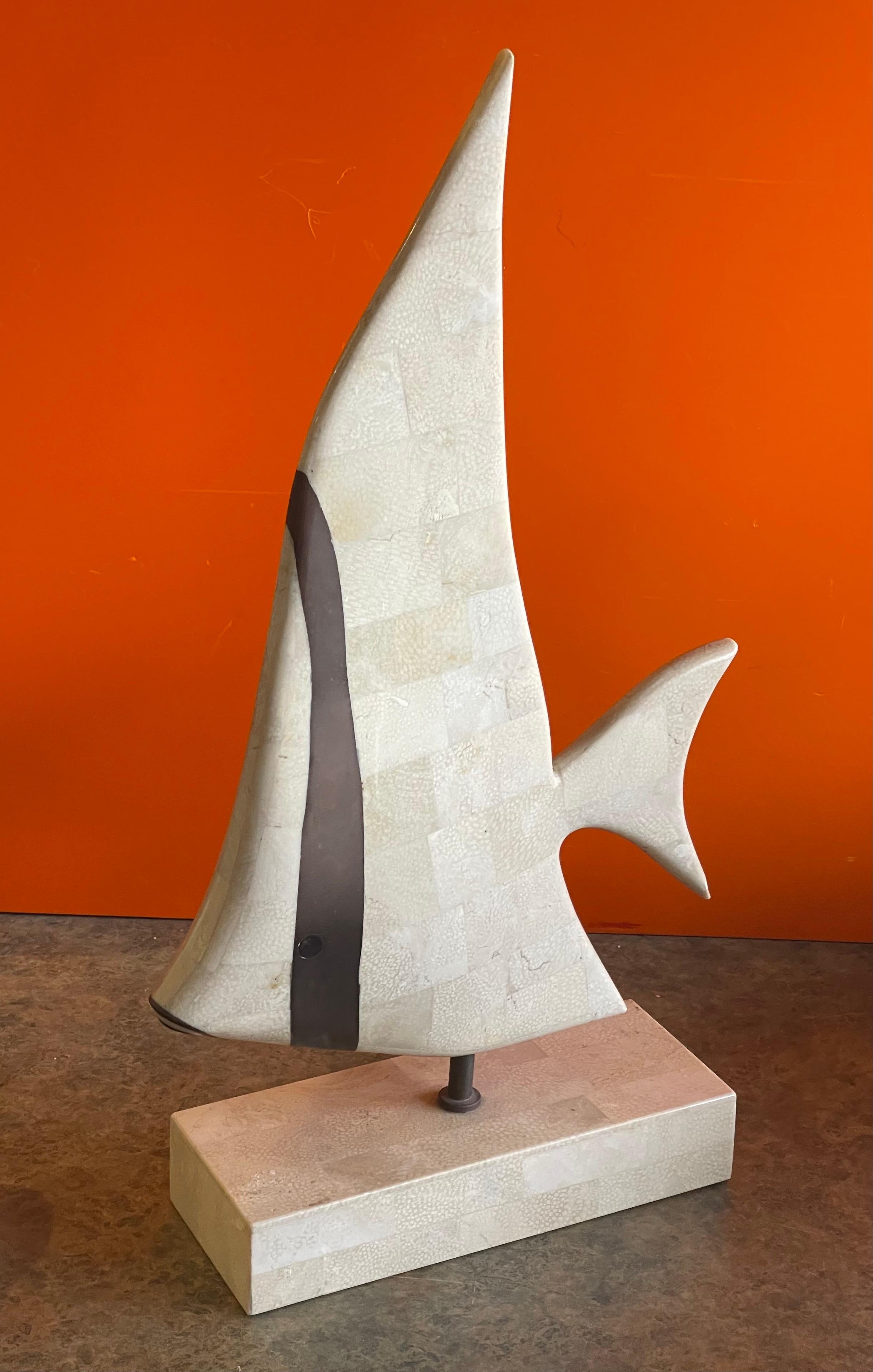 Tessellated coral stone and brass angel fish sculpture on stand by Maitland Smith, circa 1970s. The piece is in very good vintage condition and measures 9.5