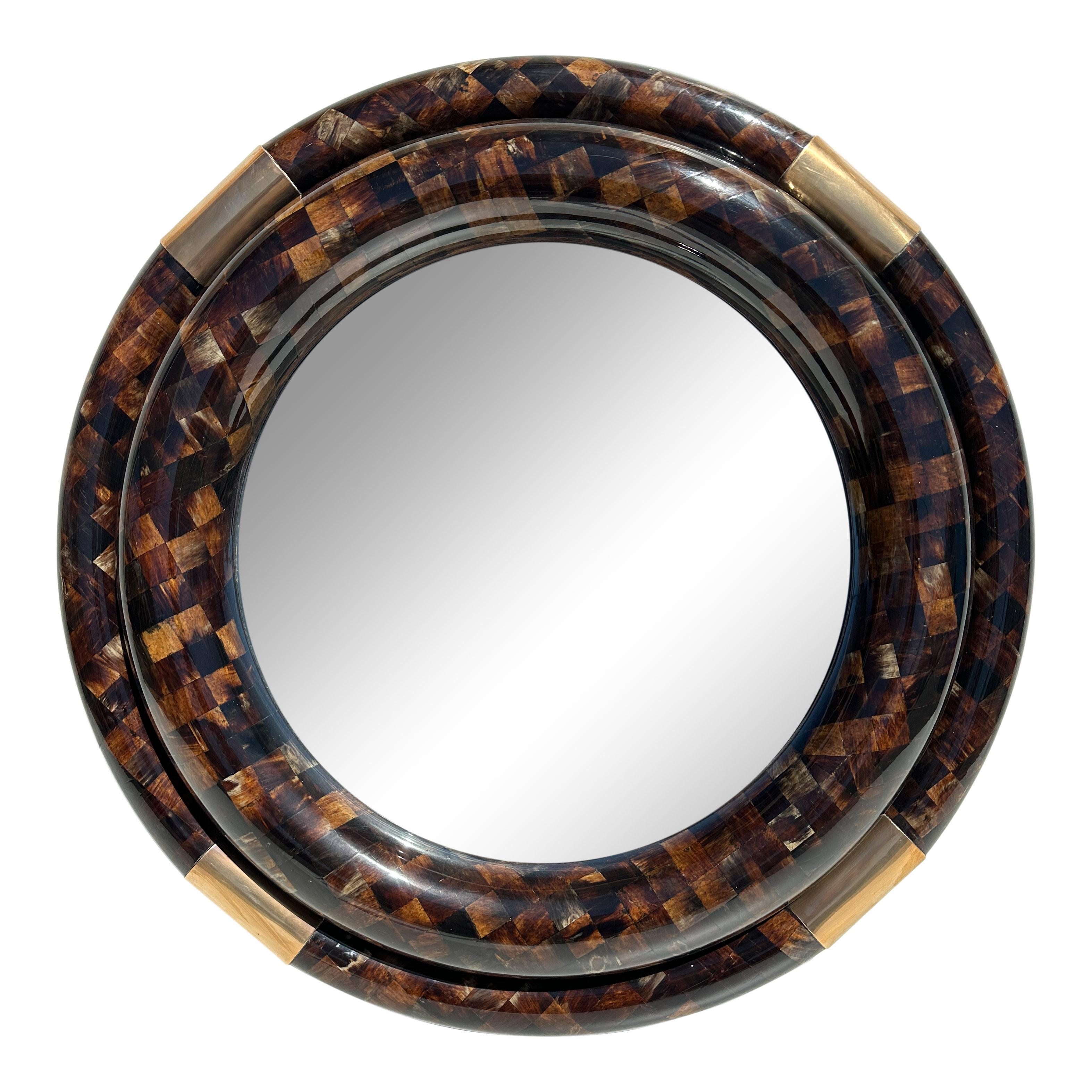 Tessellated horn and brass round bull nose mirror attributed to Enrique Garcel.