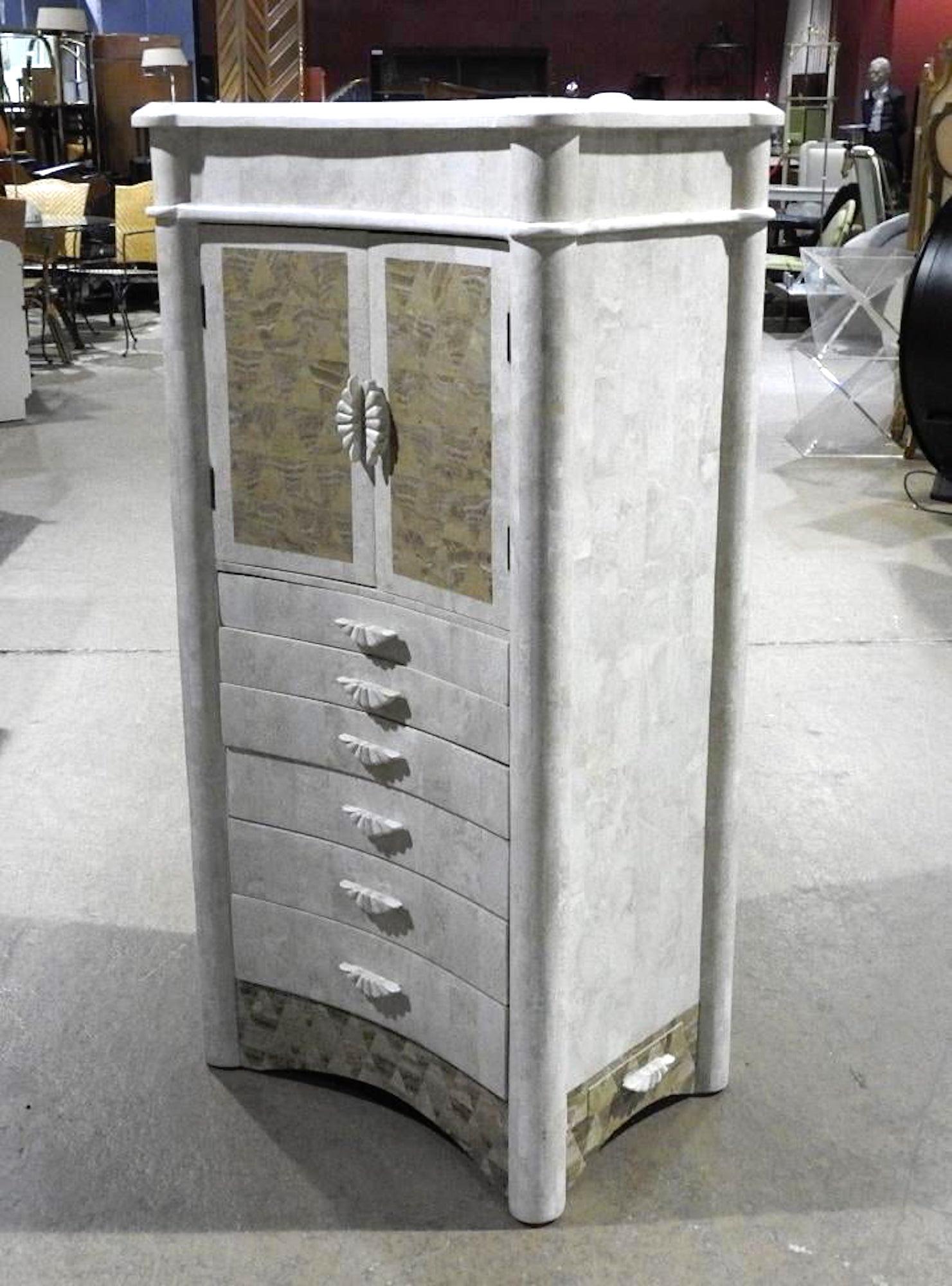 Beautiful stone chest with drawers and cabinet storage. Two doors containing 1 shelf. 6 drawers and small drawer on bottom.
(Please confirm item location - NY or NJ - with dealer).
  
