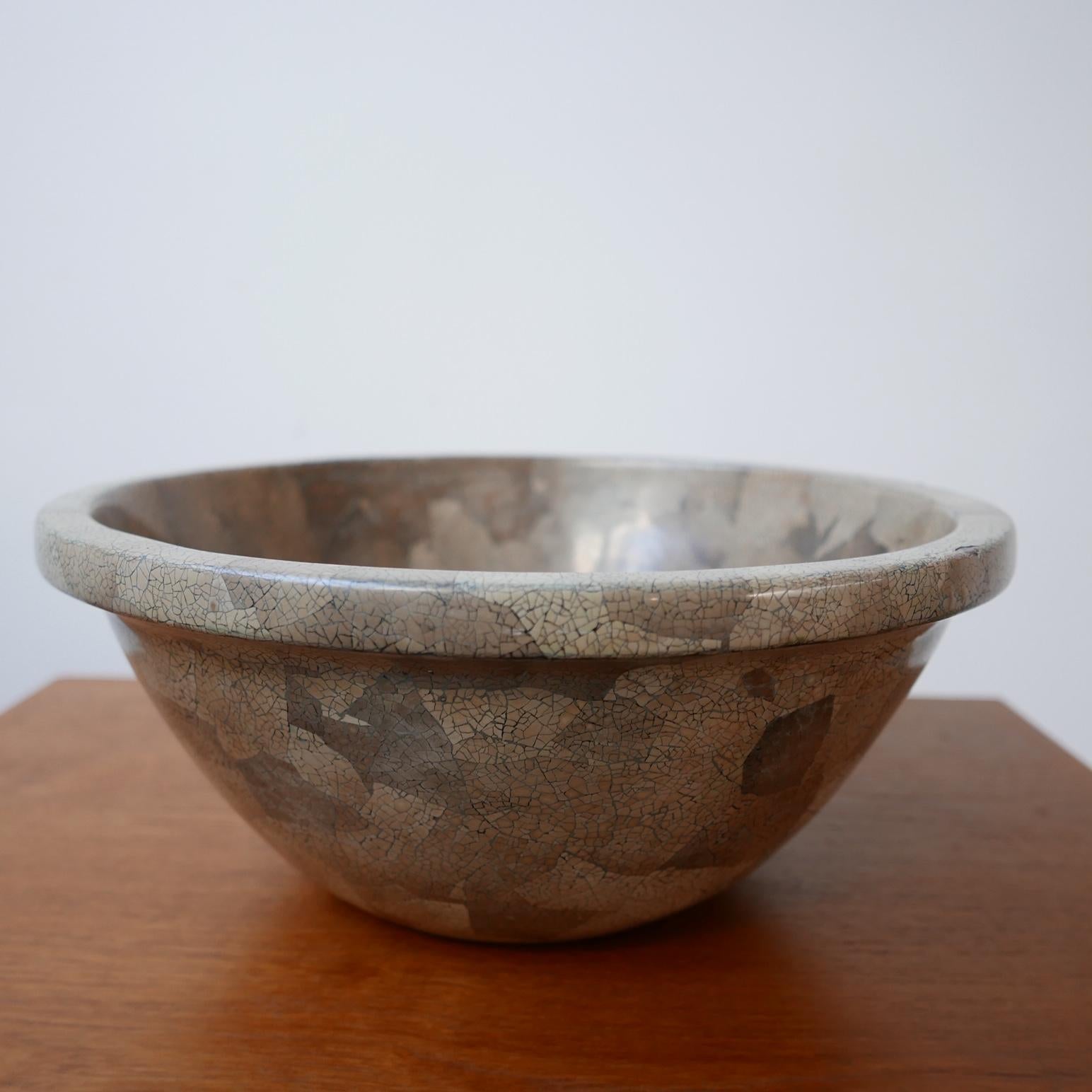 A mid to late 20th century English ceramic bowl. 

England, c1980s. 

Unusual crackle form. 

One or two dings but nothing glaring, generally good condition. 

Pleasant muted colour scheme. 

Location: London Gallery. 

Dimensions: 37