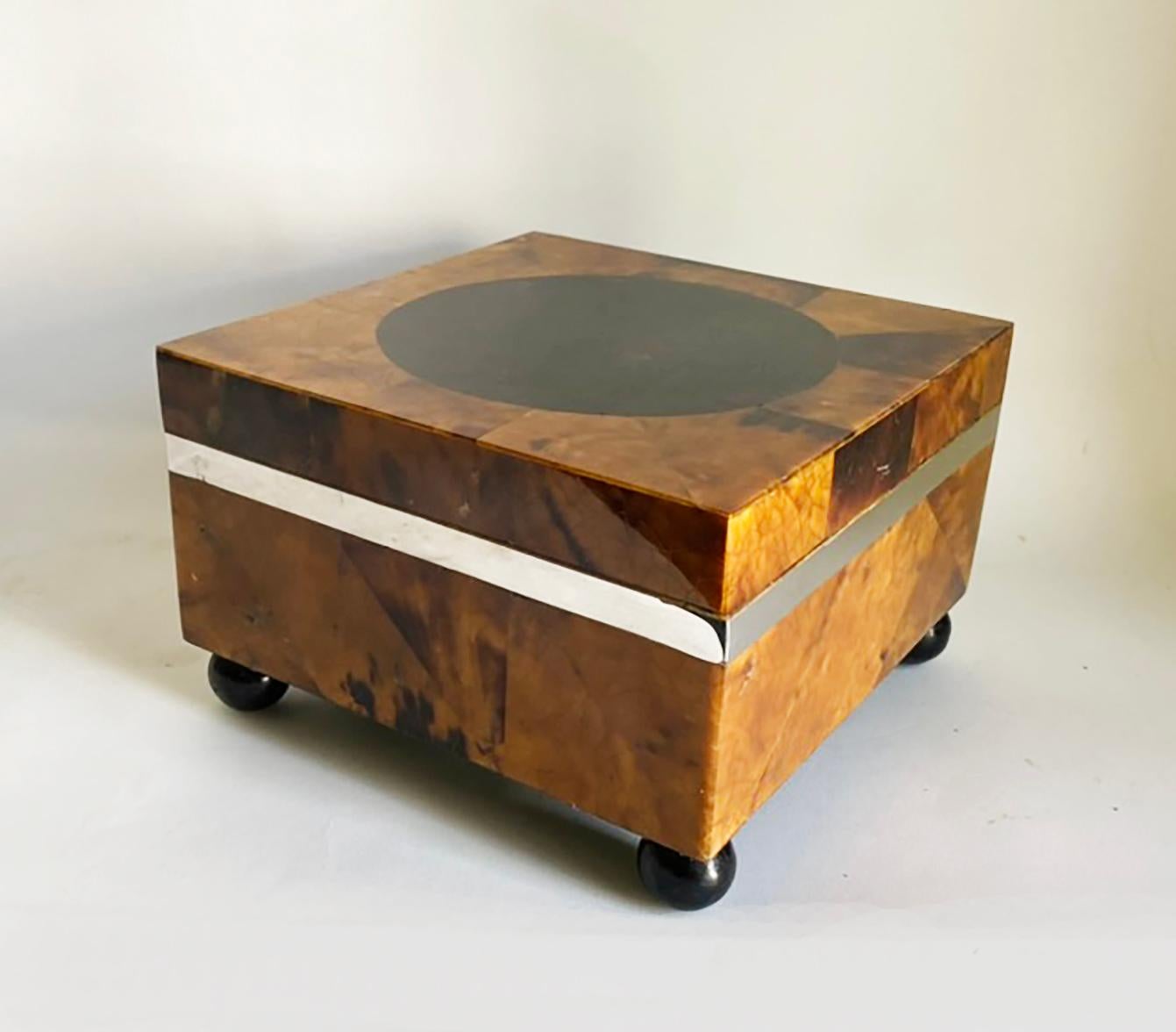 Here is a very handsome tessellated box in a rich, amber-colored pen shell material. The box is hinged and lined with a black felt-like material. This box is in very good condition with only minor wear commensurate with age and light use. We are