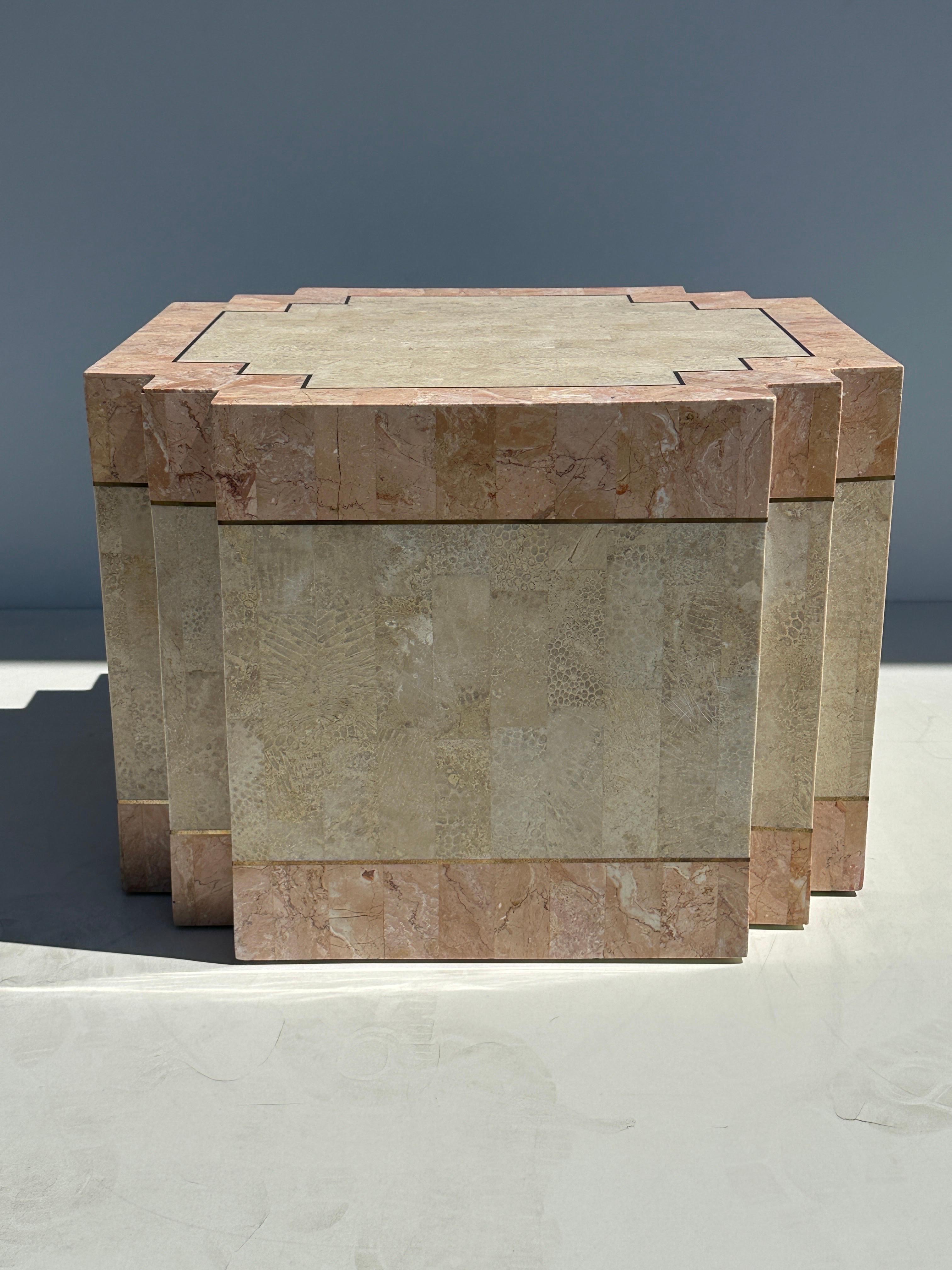 Tessellated pink stone and fossilized coral geometric coffee table base with brass accents. Can be used as is or with a glass top.
Matching side / end tables also available in our other listing.