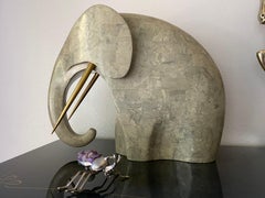 Sculpture d'éléphant en pierre tessellée et laiton