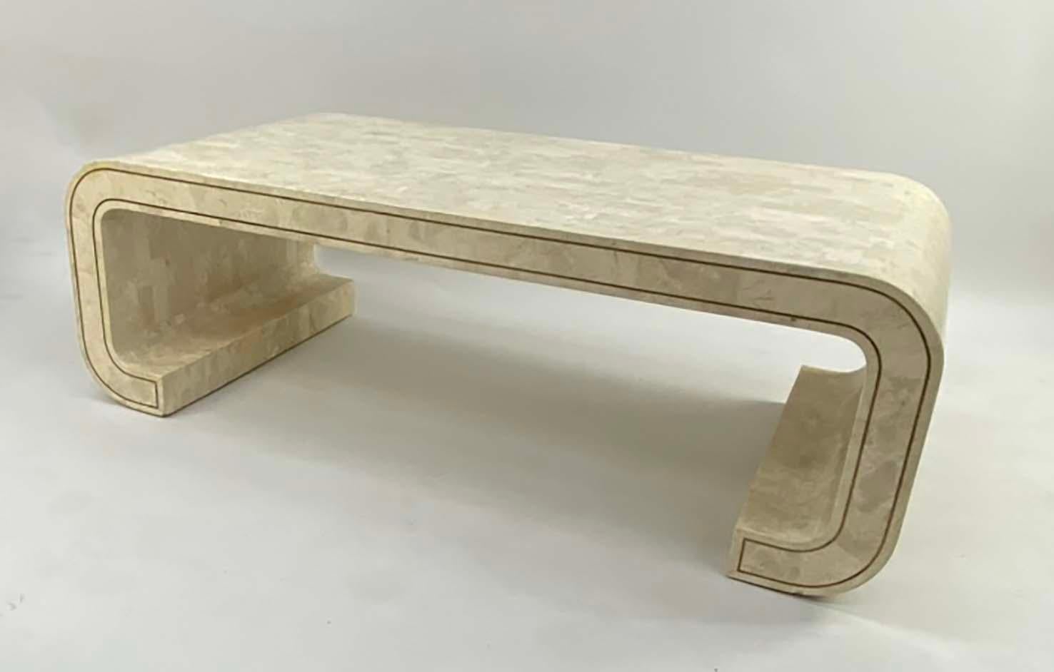 Here's a nice tessellated coffee or cocktail table attributed to Maitland Smith. The table is not signed, but it has all the characteristics of a Maitland Smith piece and no doubt made in the Philippines. This form is more desirable and unusual than