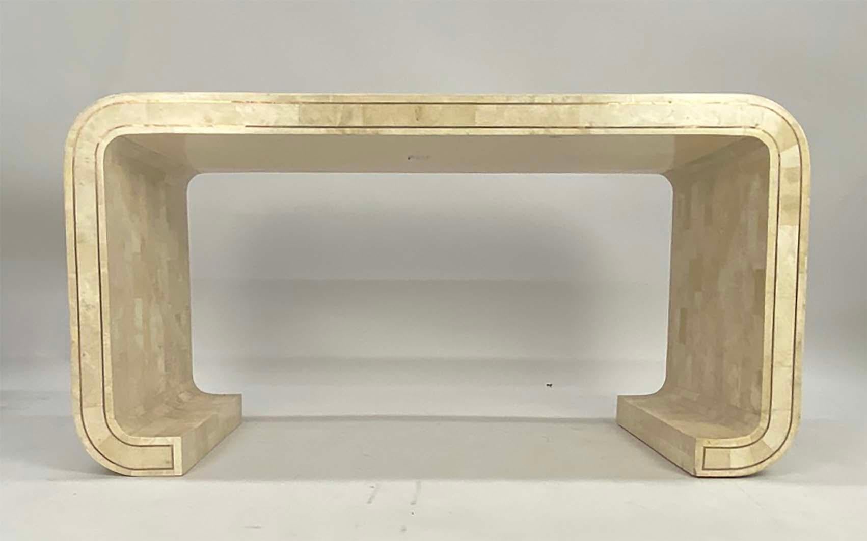 Here's a nice tessellated console table attributed to Maitland Smith. The table is not signed, but it has all the characteristics of a Maitland Smith piece and no doubt made in the Philippines. This form is more desirable and unusual than most MS