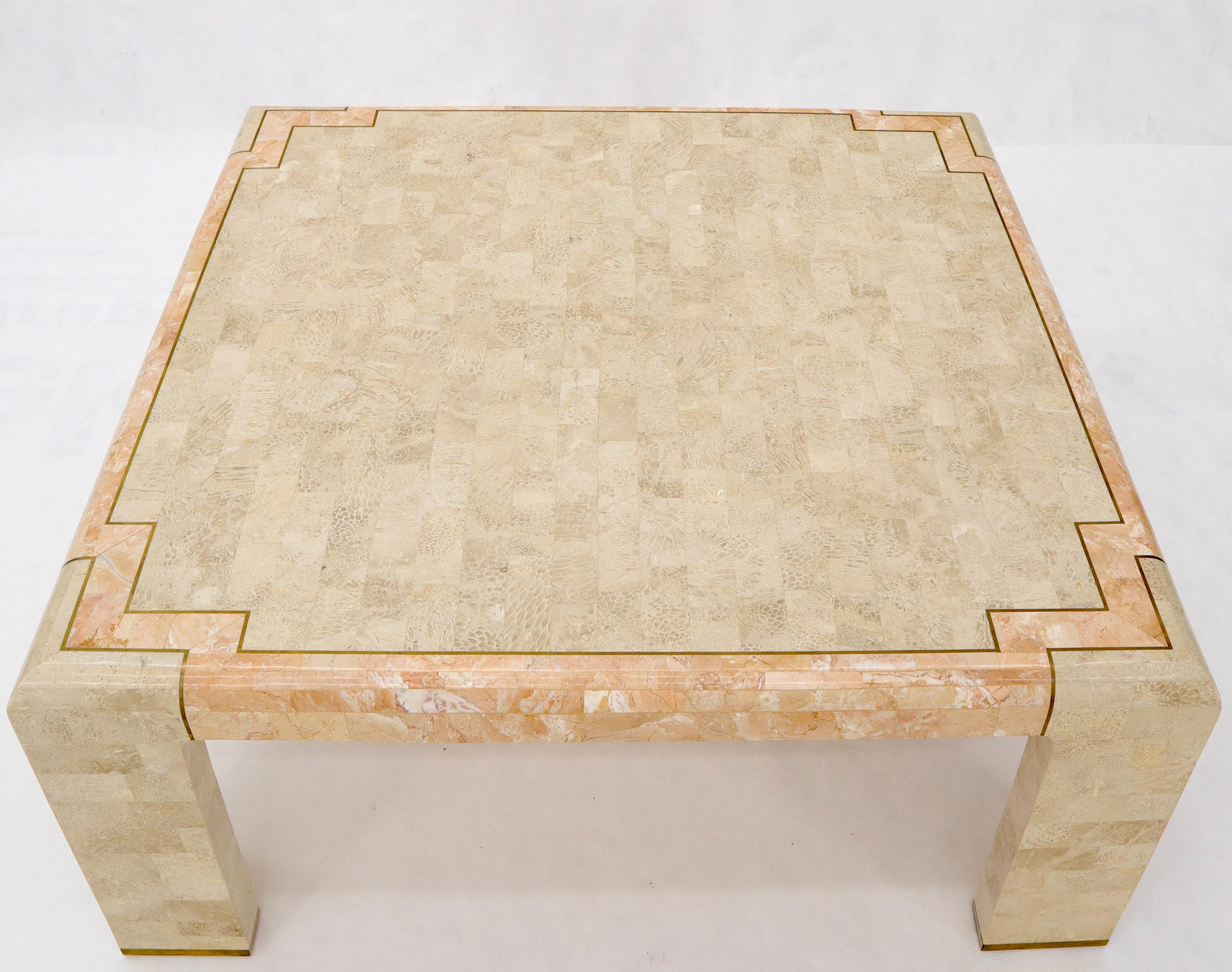 Mid-Century Modern high quality tessellated stone square coffee table with brass inlay.