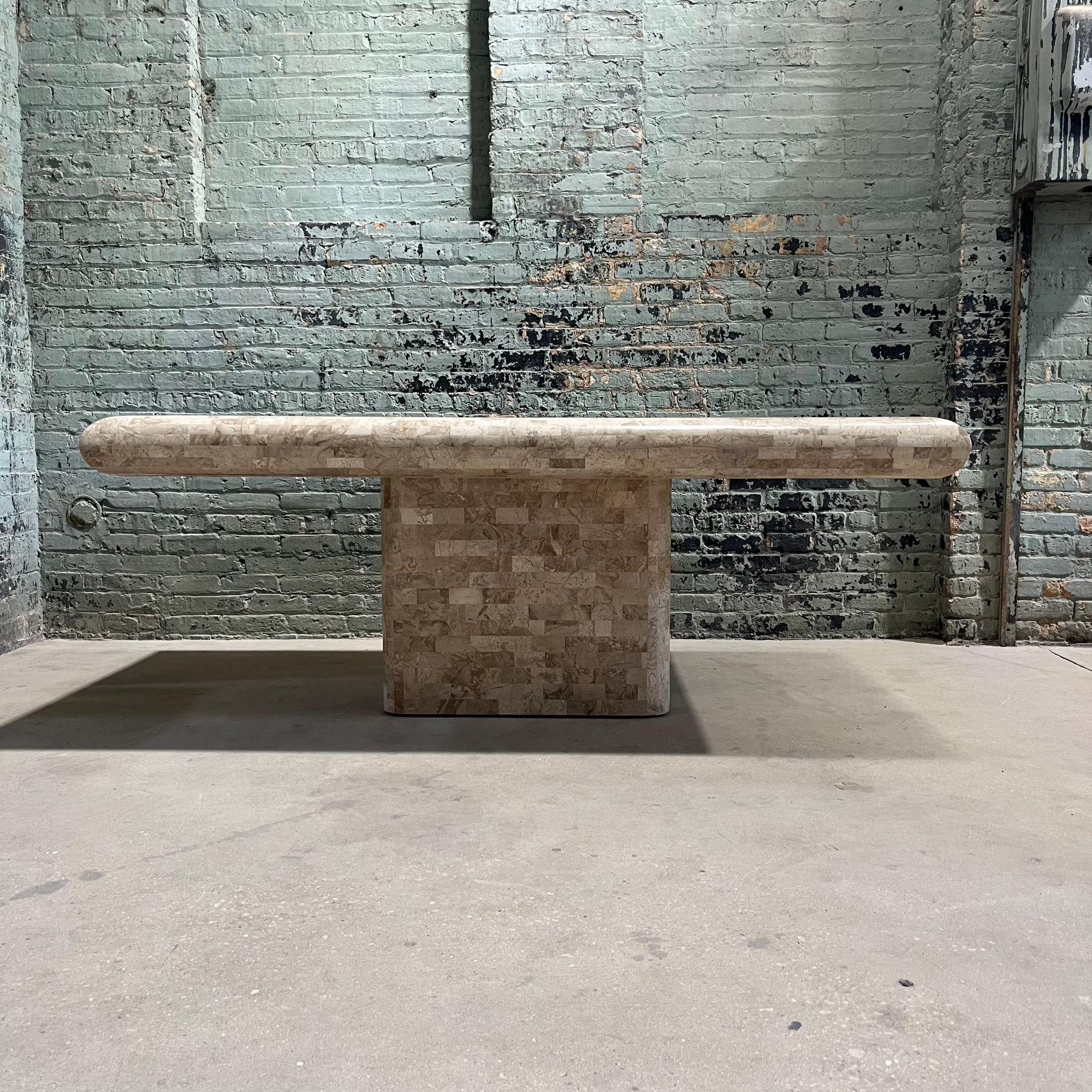 Tessellated Stone Bullnose Edge Pedestal Dining Table by Maitland Smith, 1980. Original
Measures 78,25' long 42