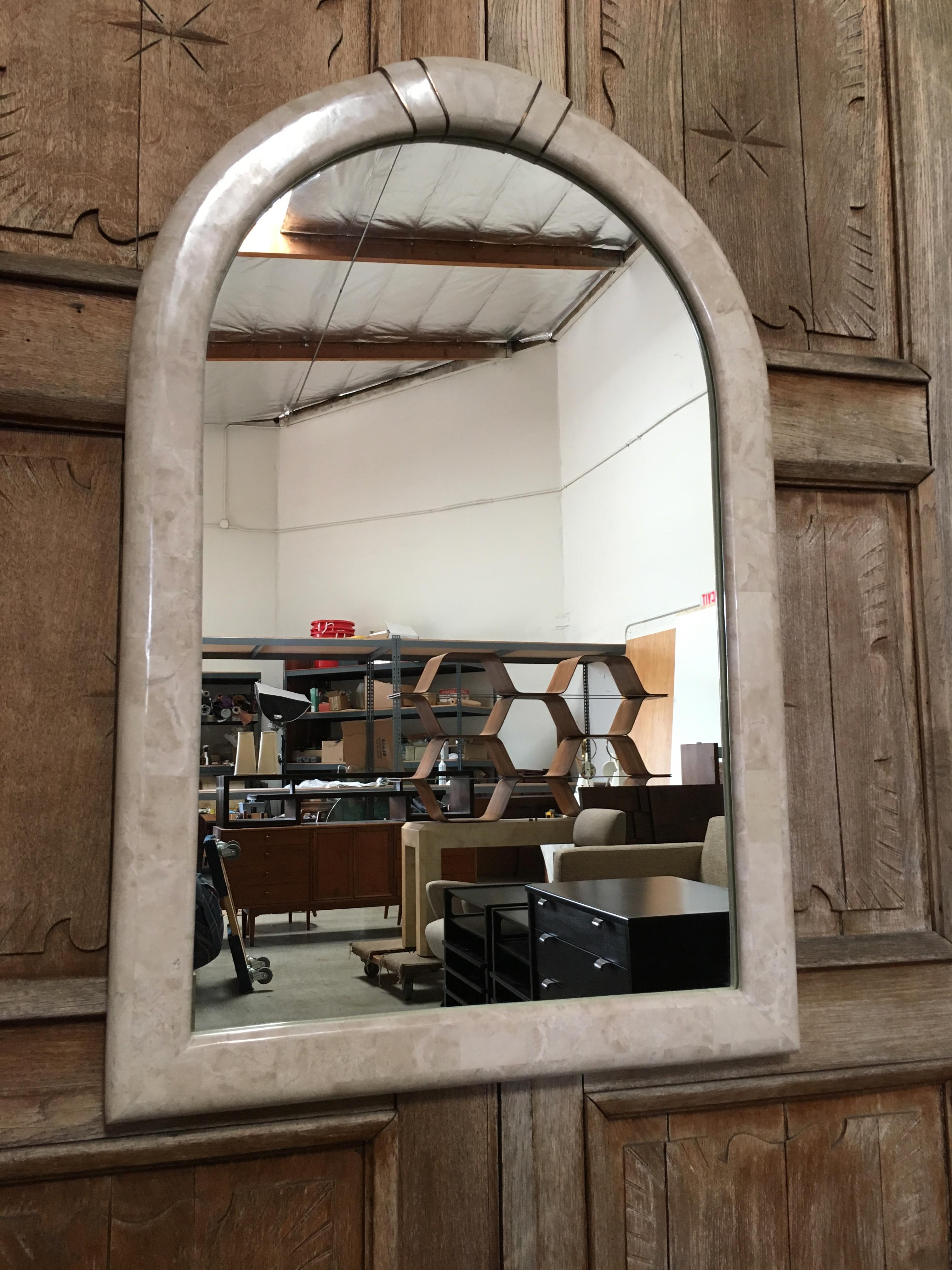 Maitland-Smith style mirror frame with travertine and brass inlay.