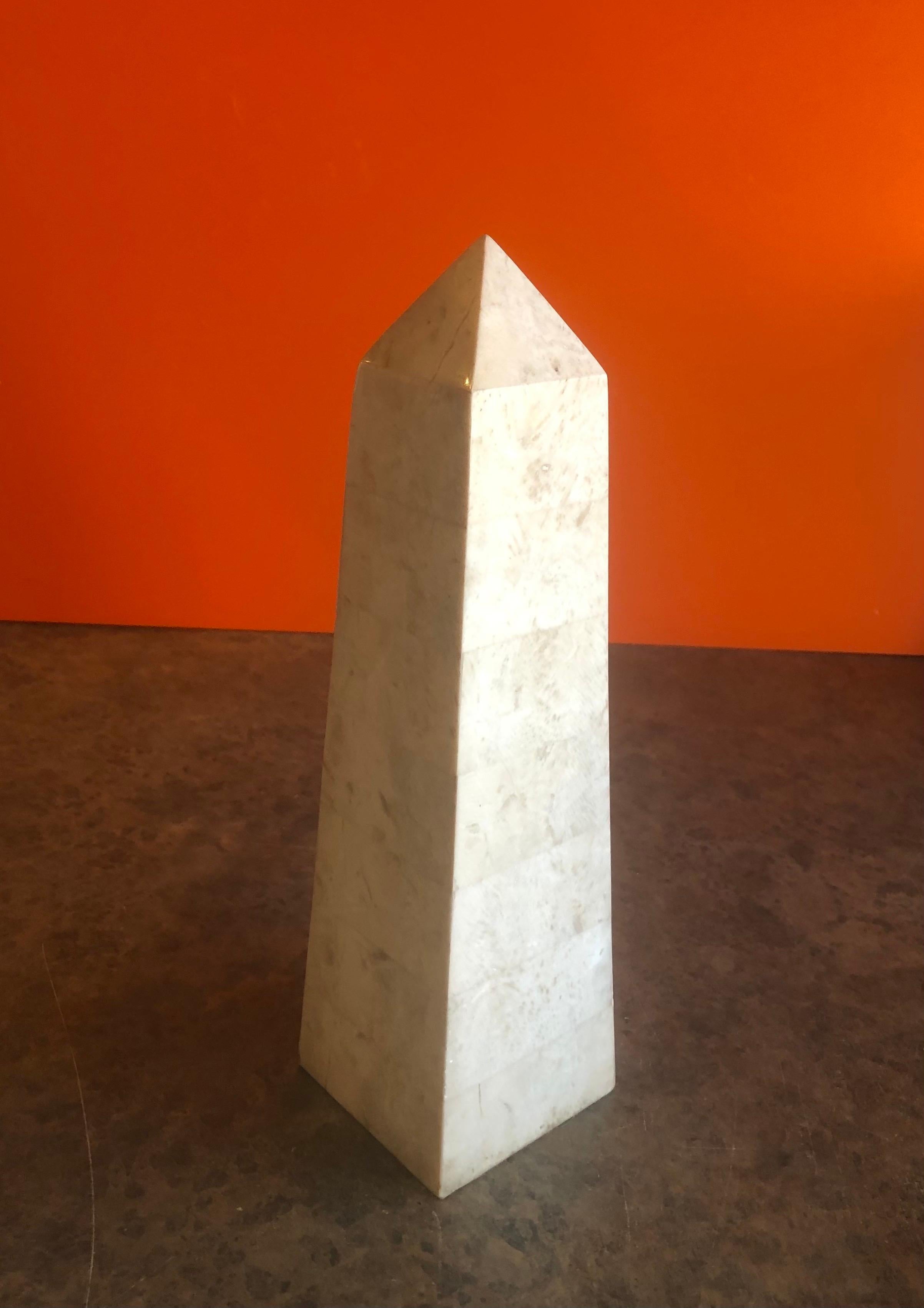 Tessellated stone obelisk in the style of Marquis Collection of Beverly Hills, circa 1980s. The piece was made in the Philippines and measures: 3.25