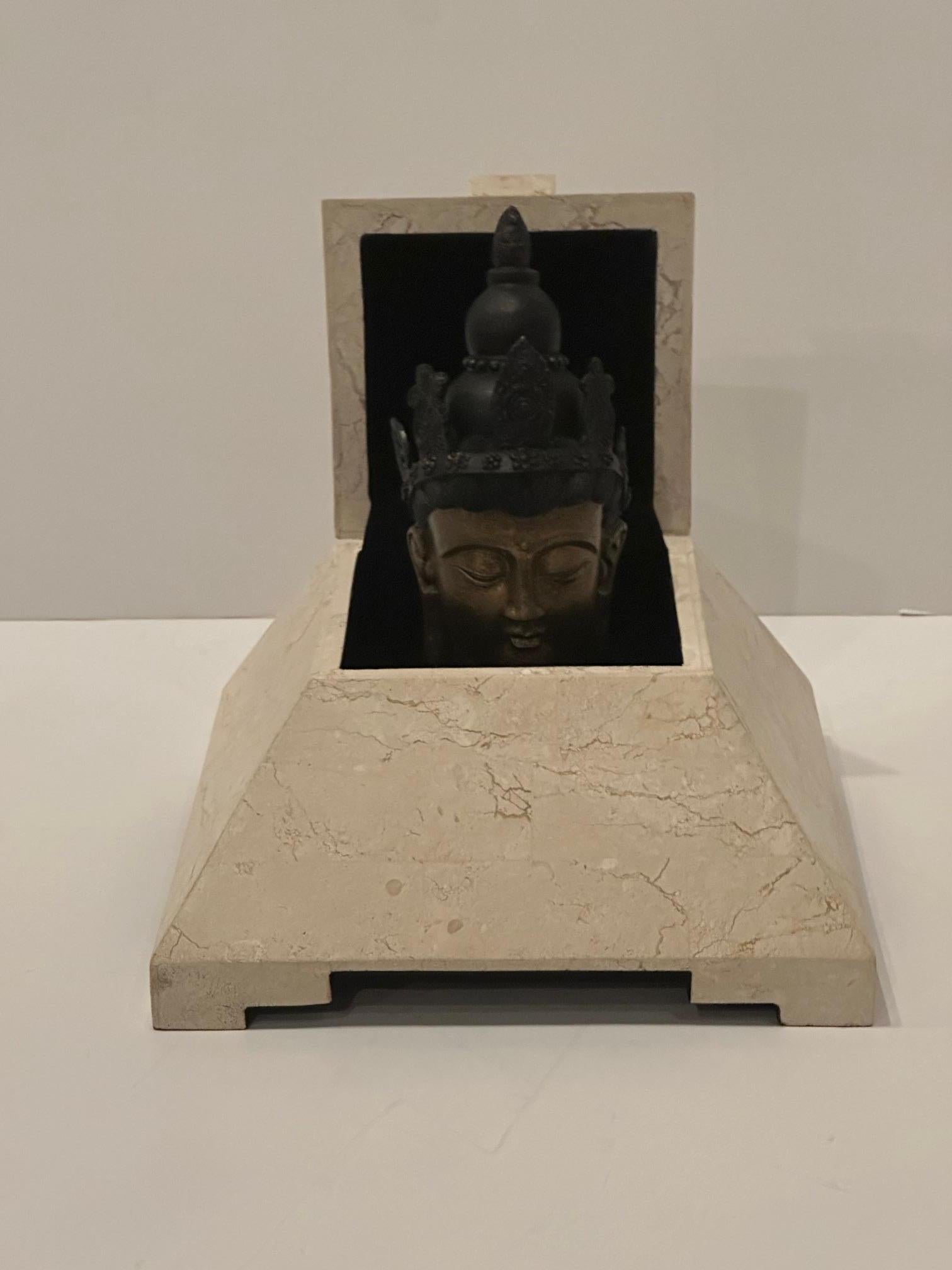 Stylish tessellated cream stone decorative box in the shape of a pyramid.  Makes an unexpected sophisticated accessory on console or coffee table.