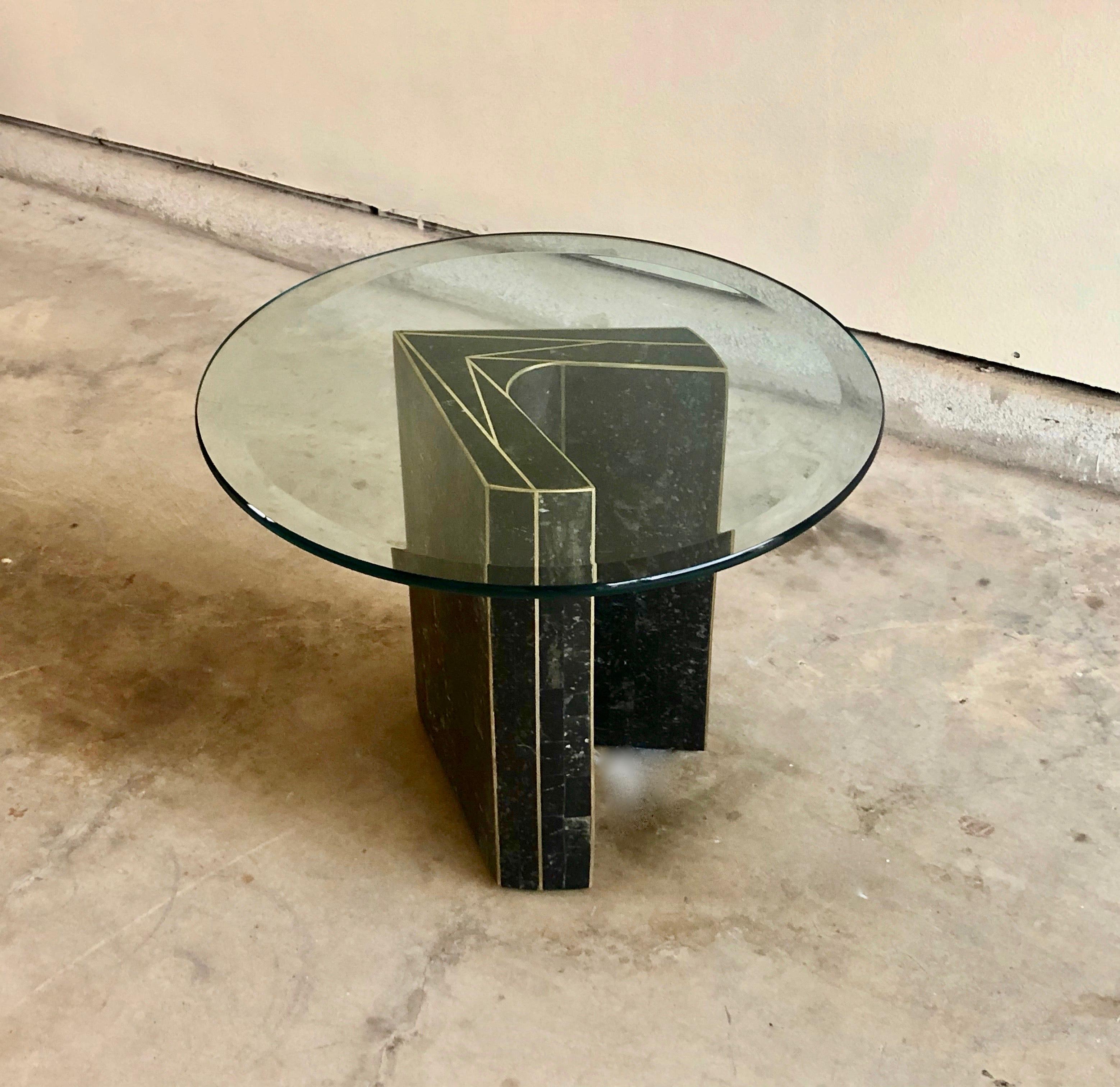 Tessellated black with brass trim stone side table in the style of Maitland Smith table base is 13 x 13.