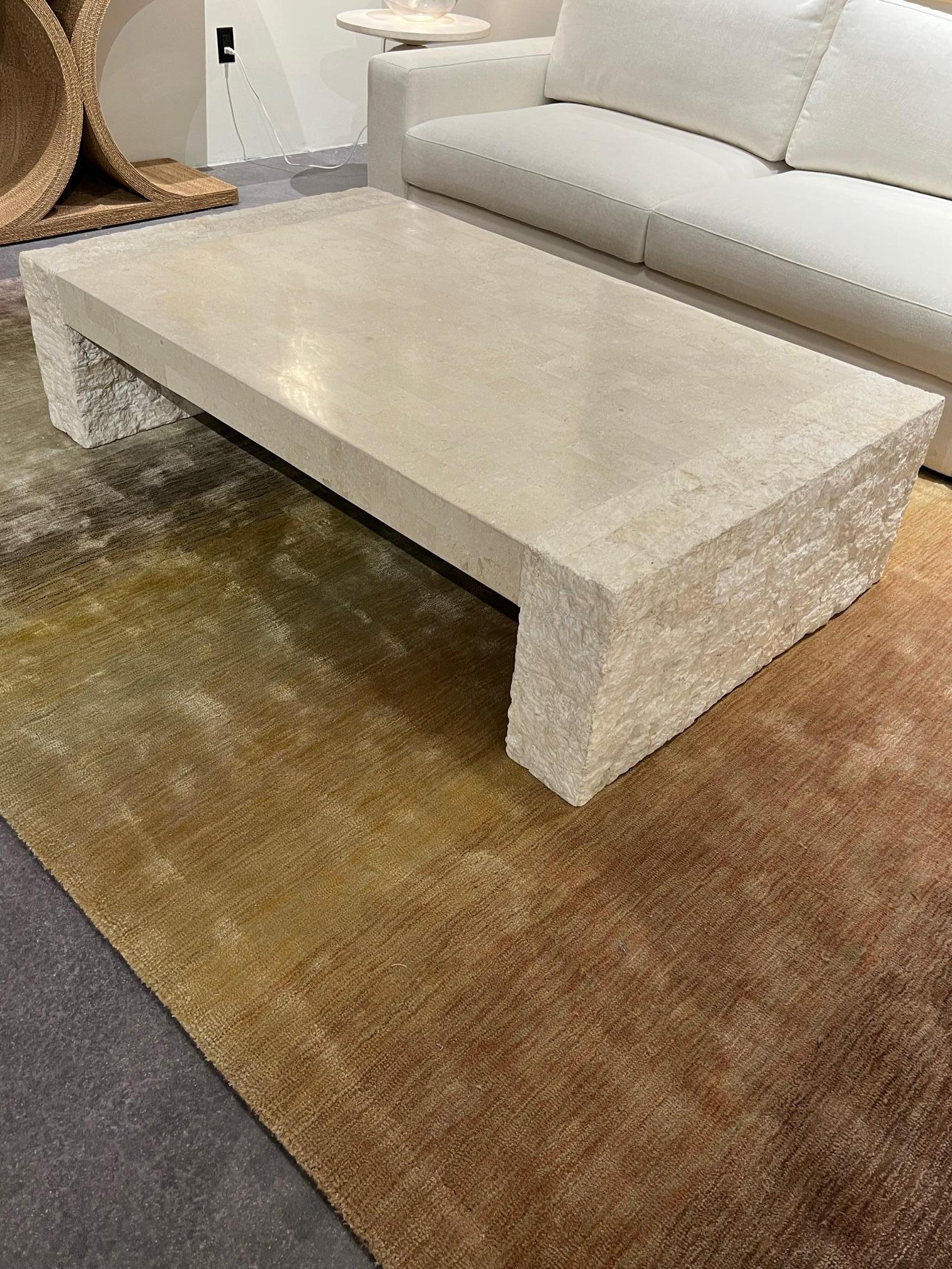 The table uses fossilized stone in its raw form and as an inlay. Combining the textures makes this piece unique. This is a one of kind piece, not from production.
