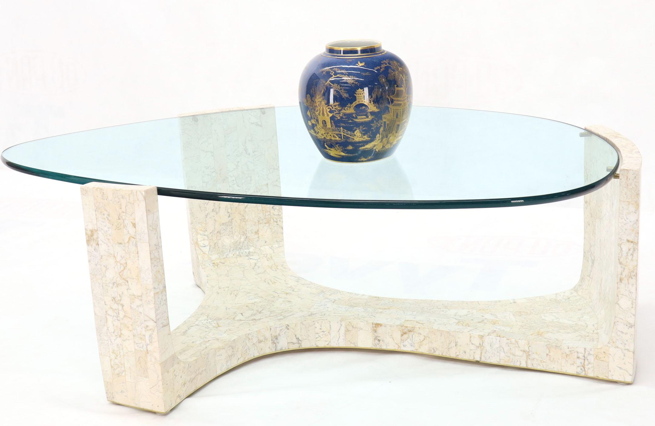 Mid-Century Modern stunning looking shape and quality organic kidney shape coffee table. Nice heavy and solid glass top. Thick quality made solid brass pins. Enrique Garcia Maitland Smith decor.