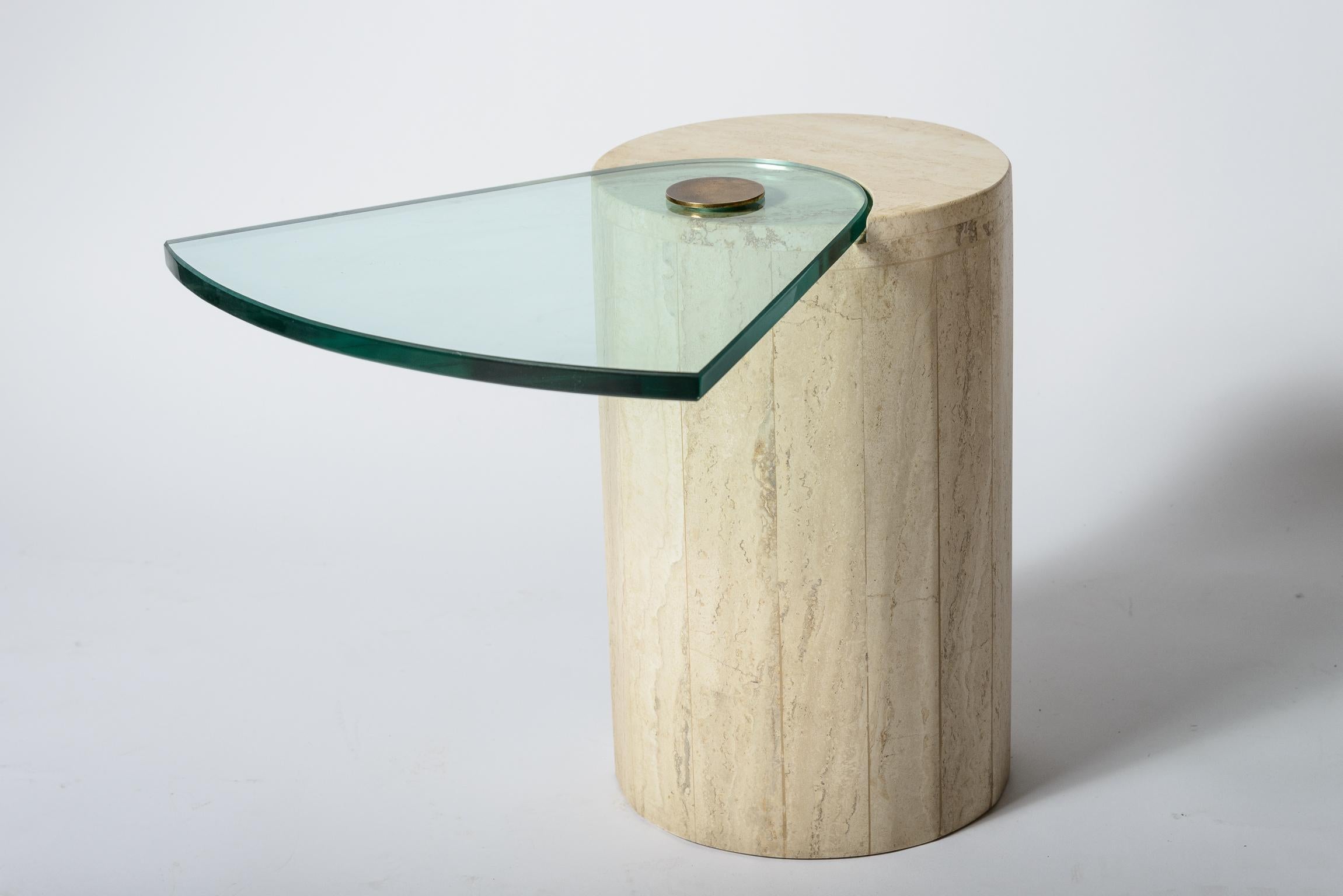 An Off Set sculpture table after a design by Karl Springer
Tessellated Stone Base
Original Glass Pie Shape top