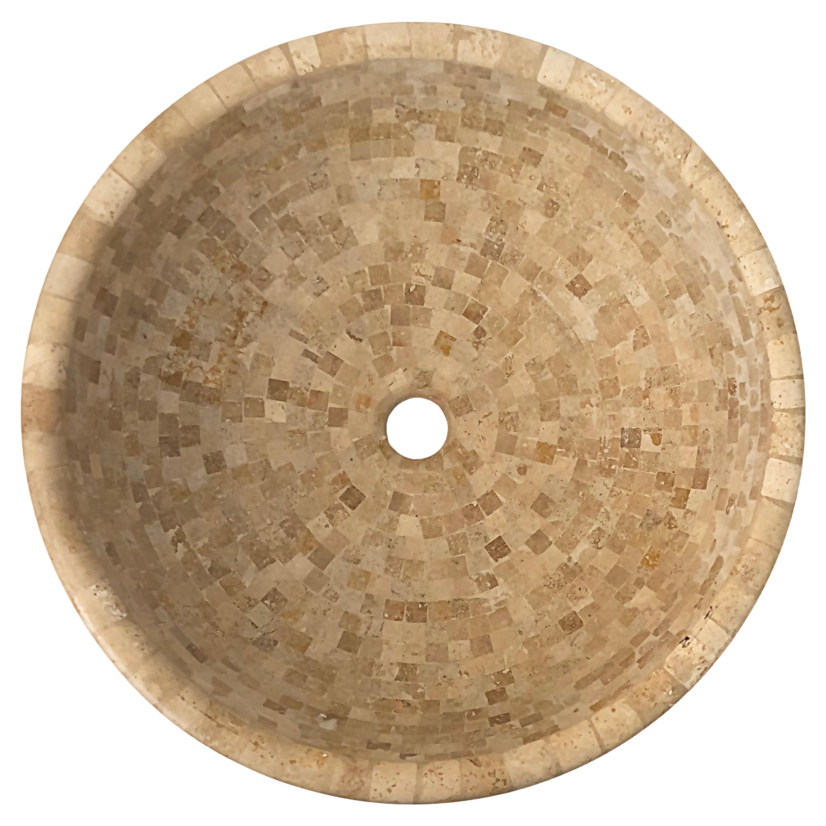 Tessellated Travertine Mosaic round sink vessel, 21st-century

Offered for sale is a 21st-century tessellated travertine sink vessel to install above a bathroom counter. The vessel is created from tessellated mosaic pieces of travertine that